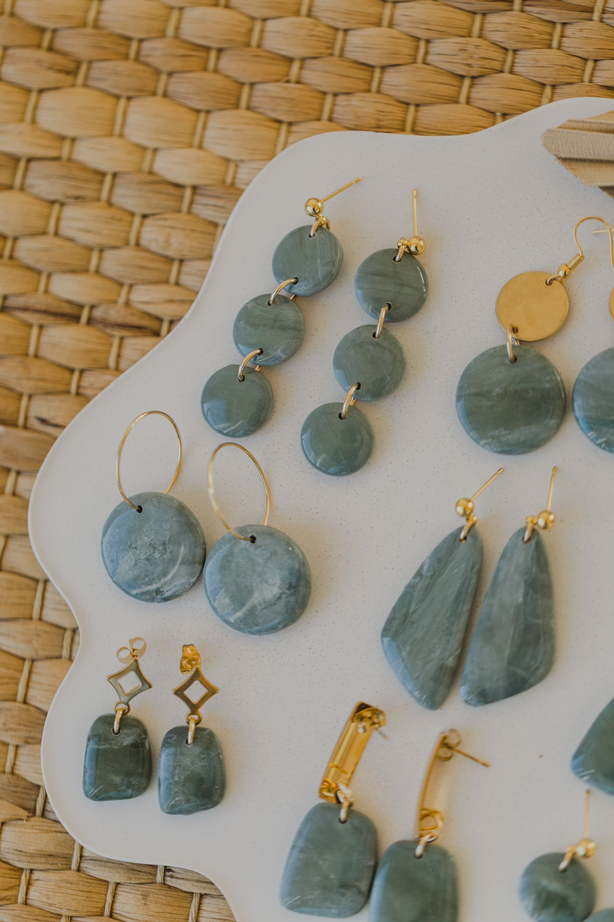 Hoop earrings with round polymer clay pendant and leaf