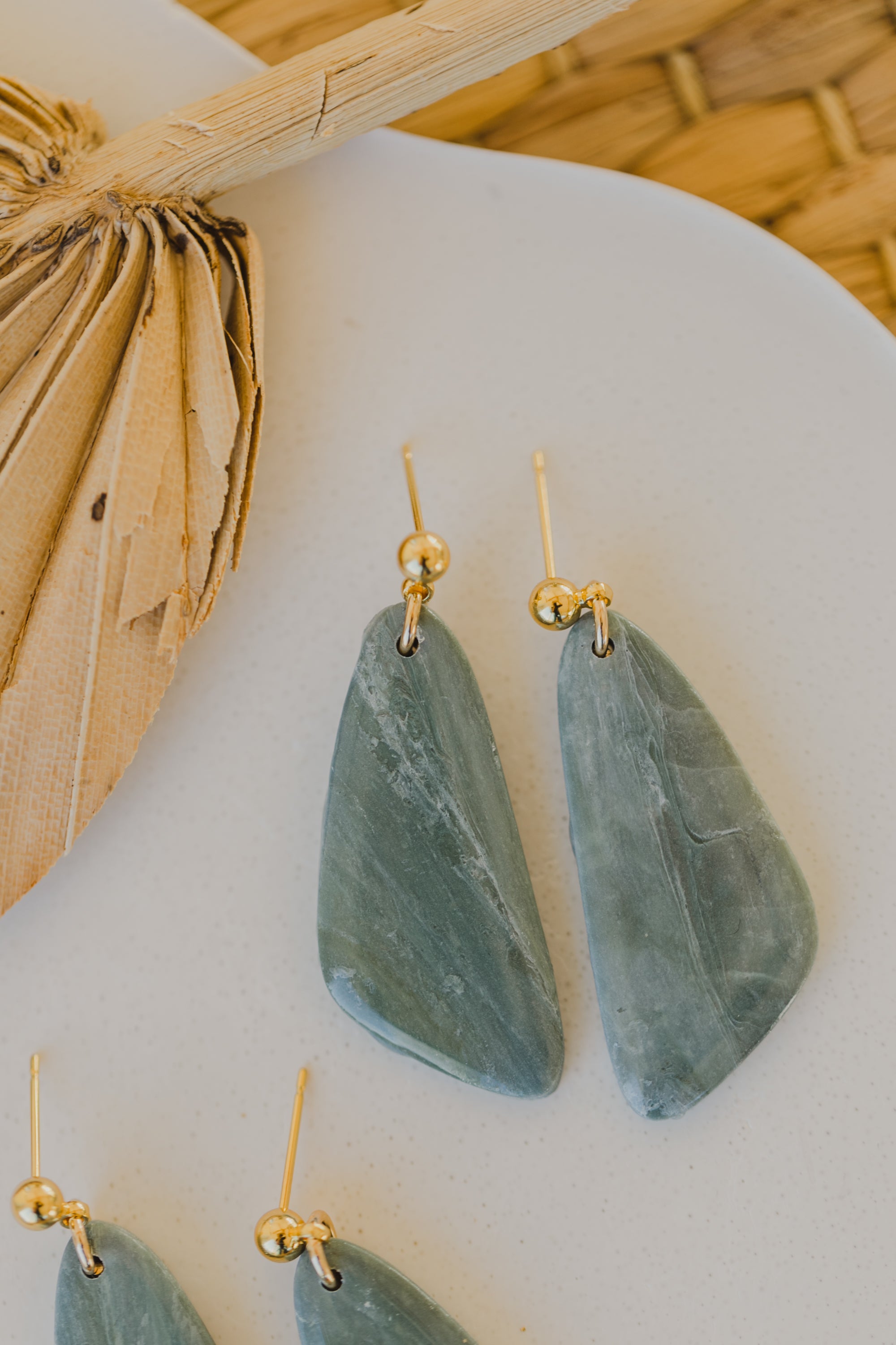 Hoop earrings with round polymer clay pendant and leaf
