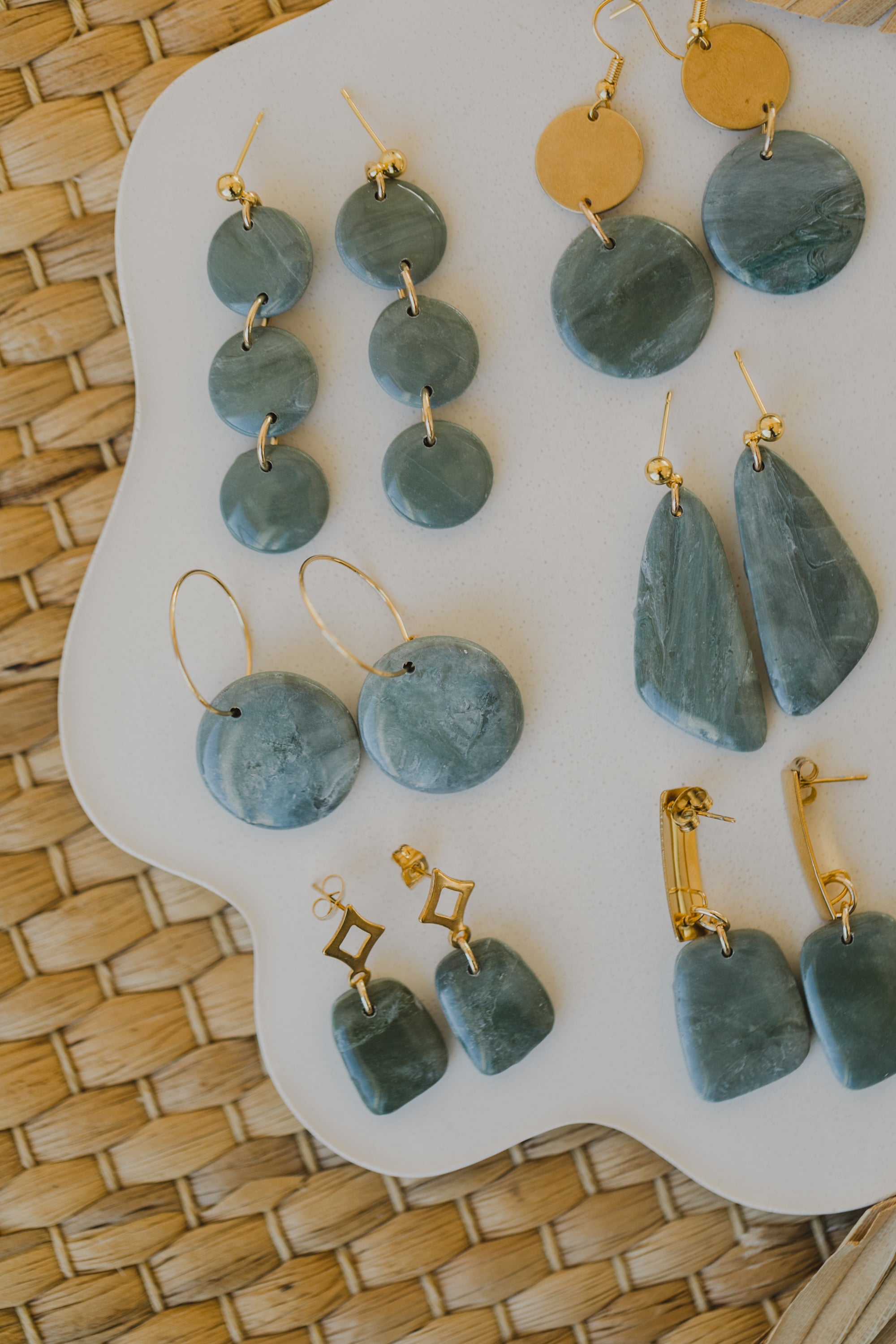 Hoop earrings with round polymer clay pendant and leaf