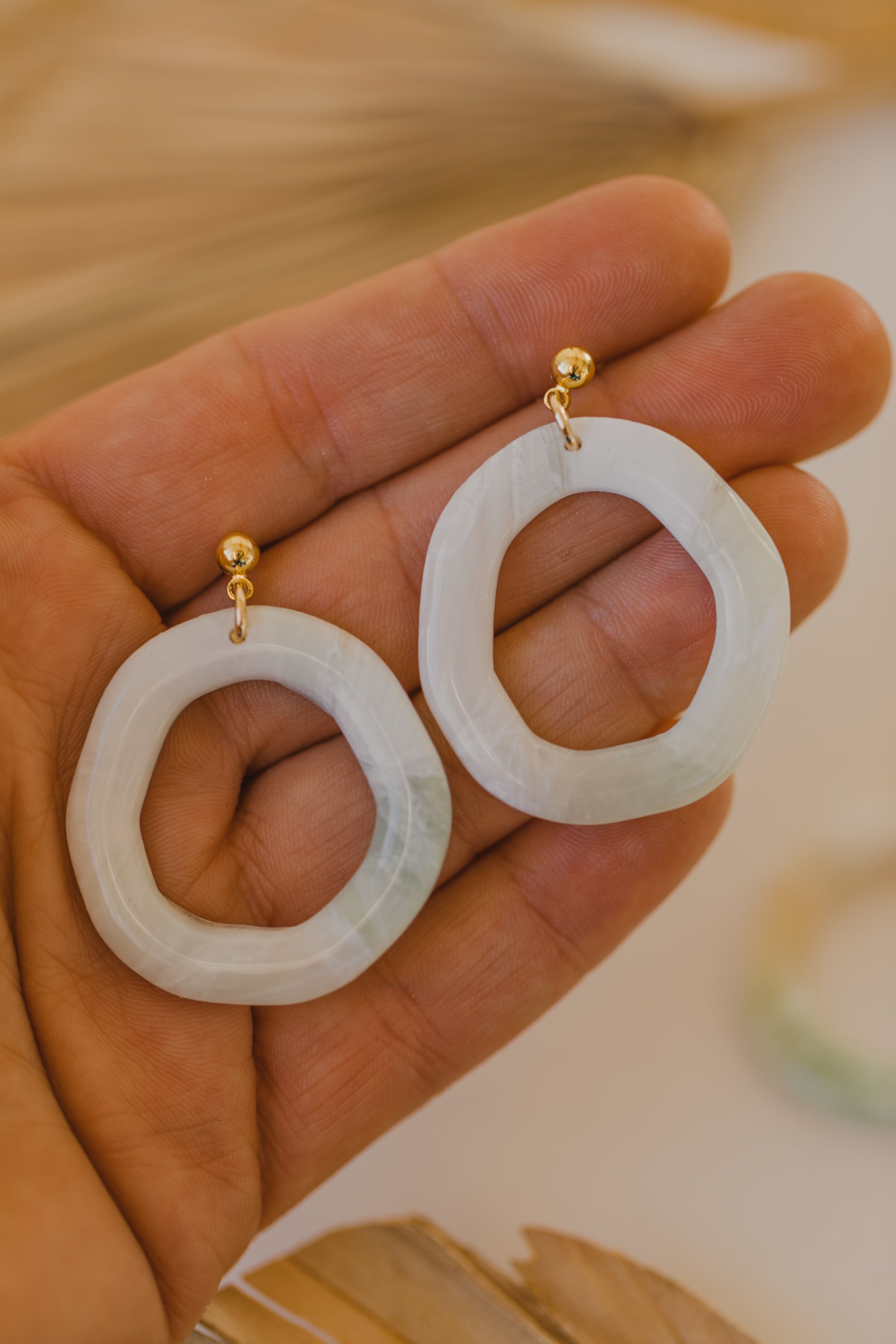 Polymer clay earrings in light green