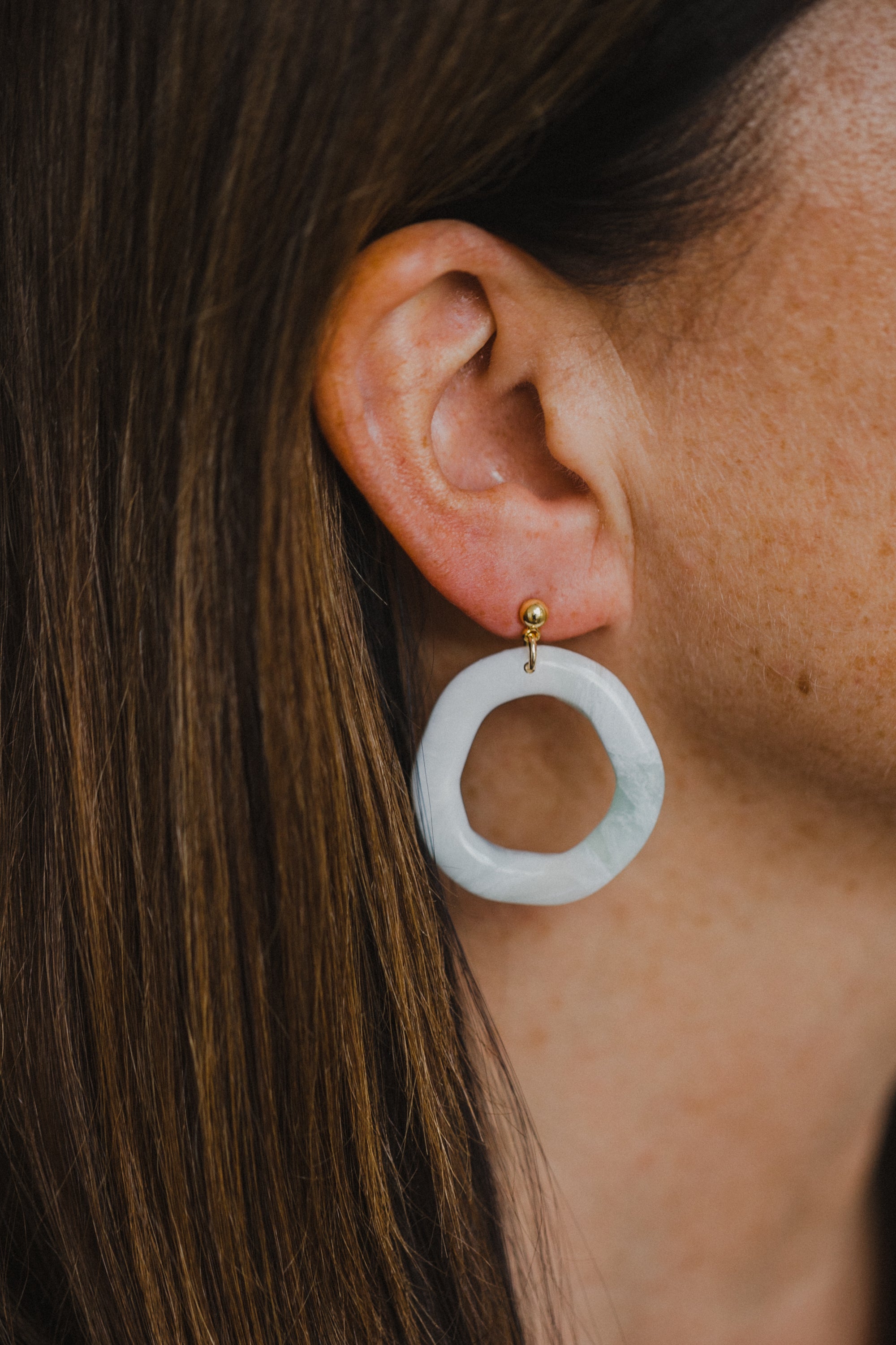 Polymer clay earrings in light green
