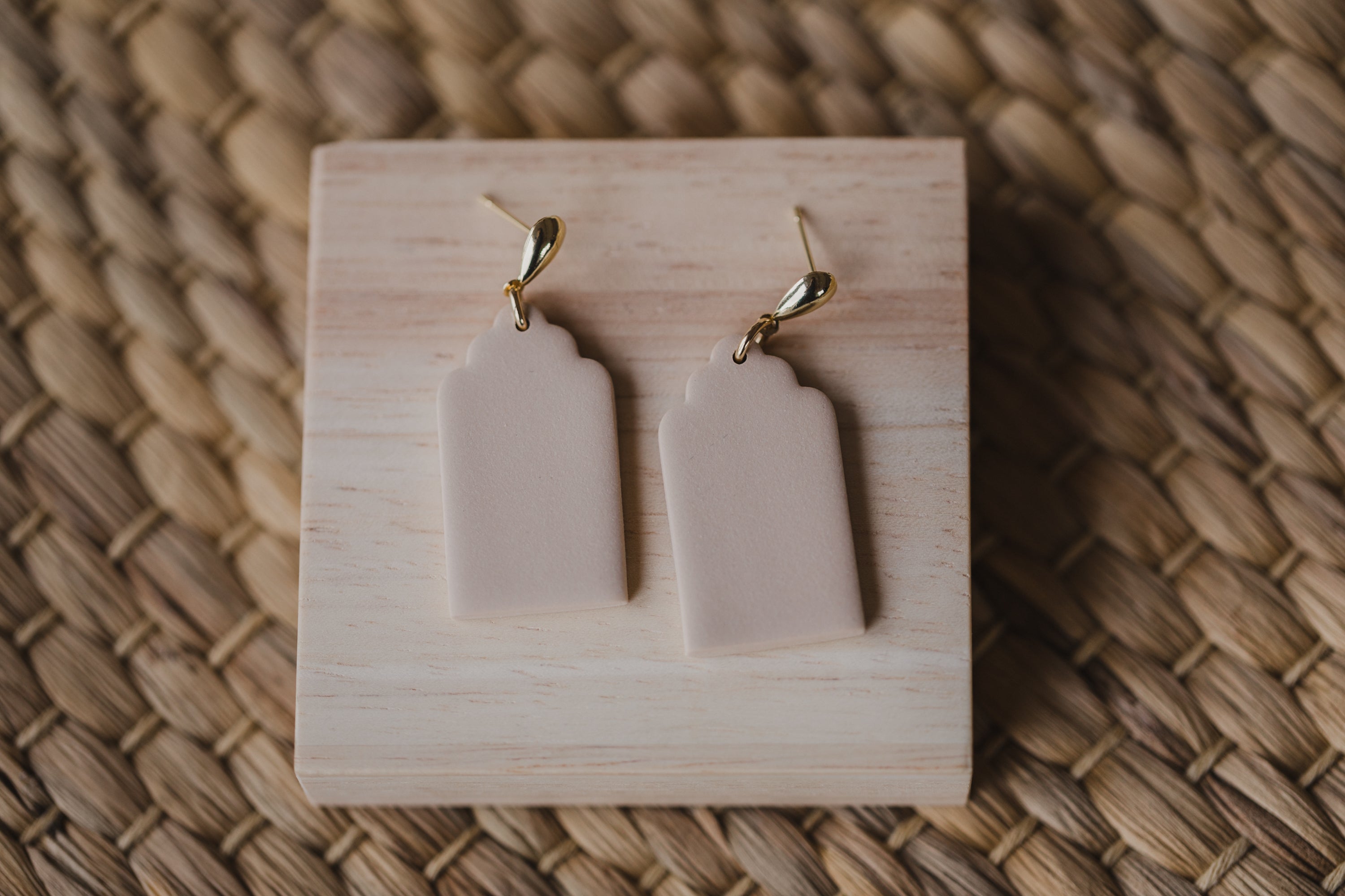 golden earrings with acrylic in white, petrol and brown