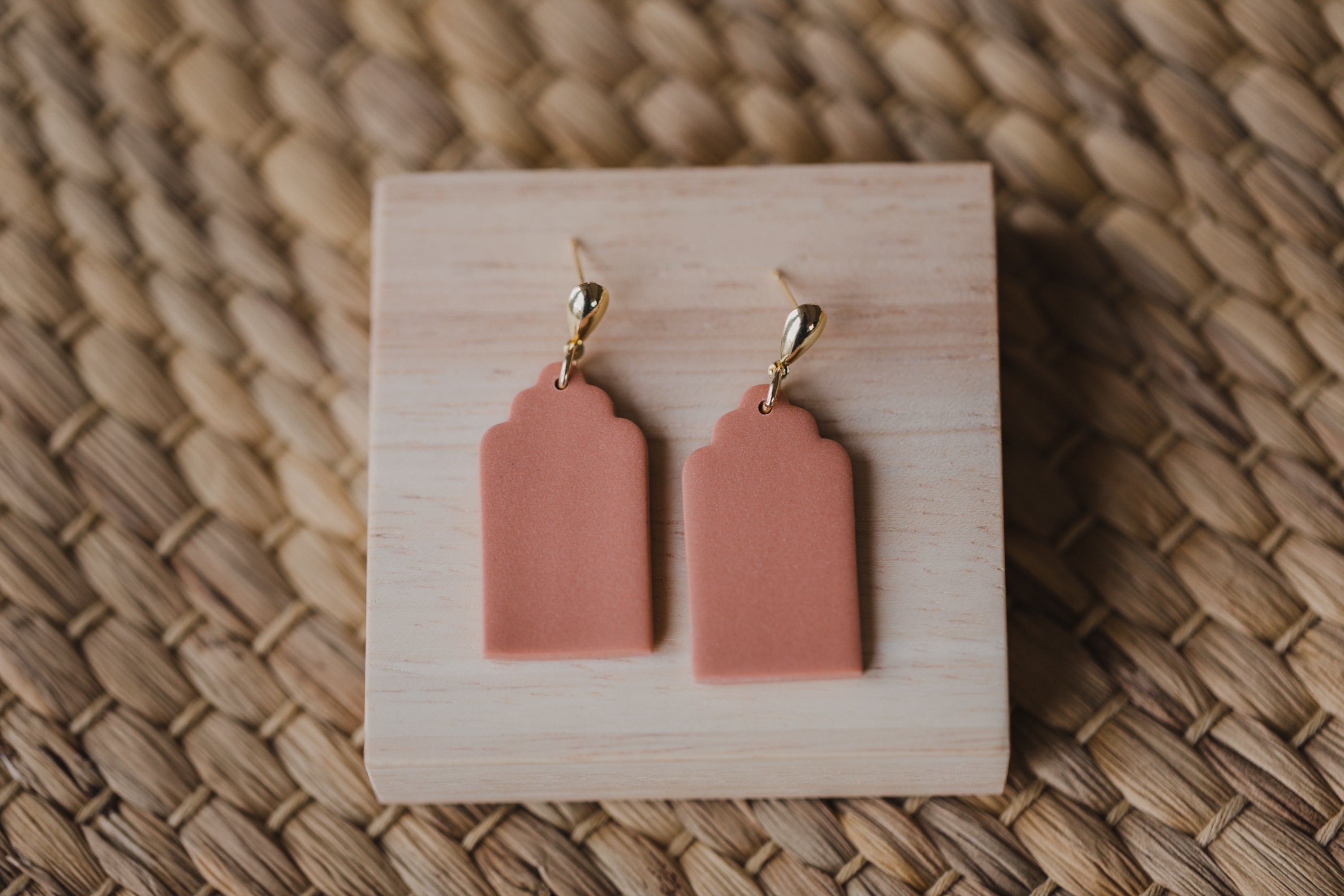 golden earrings with acrylic in white, petrol and brown
