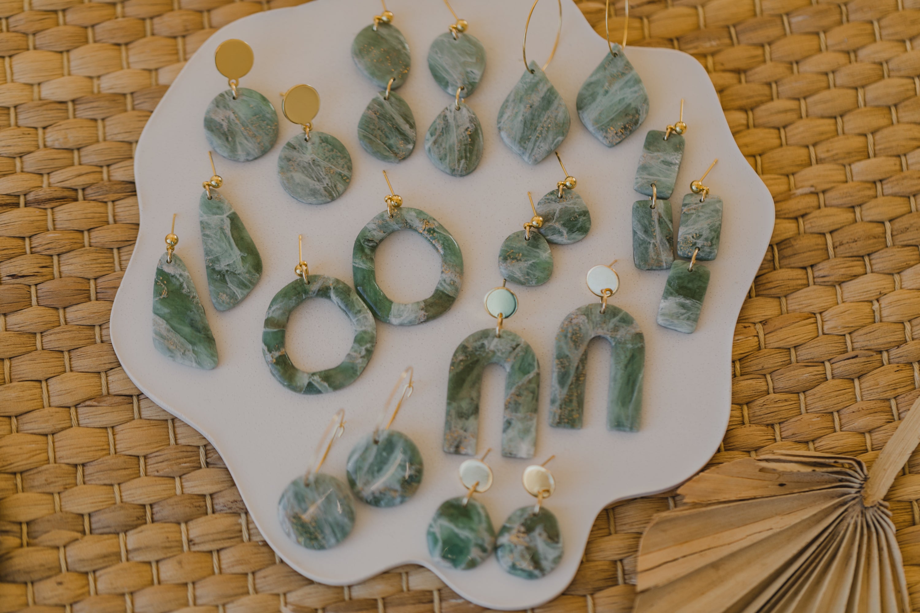 Polymer clay earrings in light green