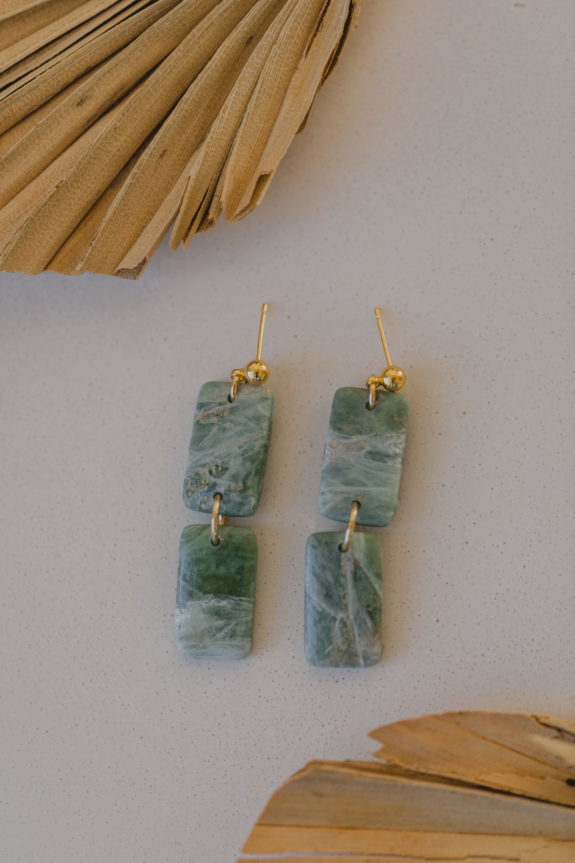 Polymer clay earrings in light green