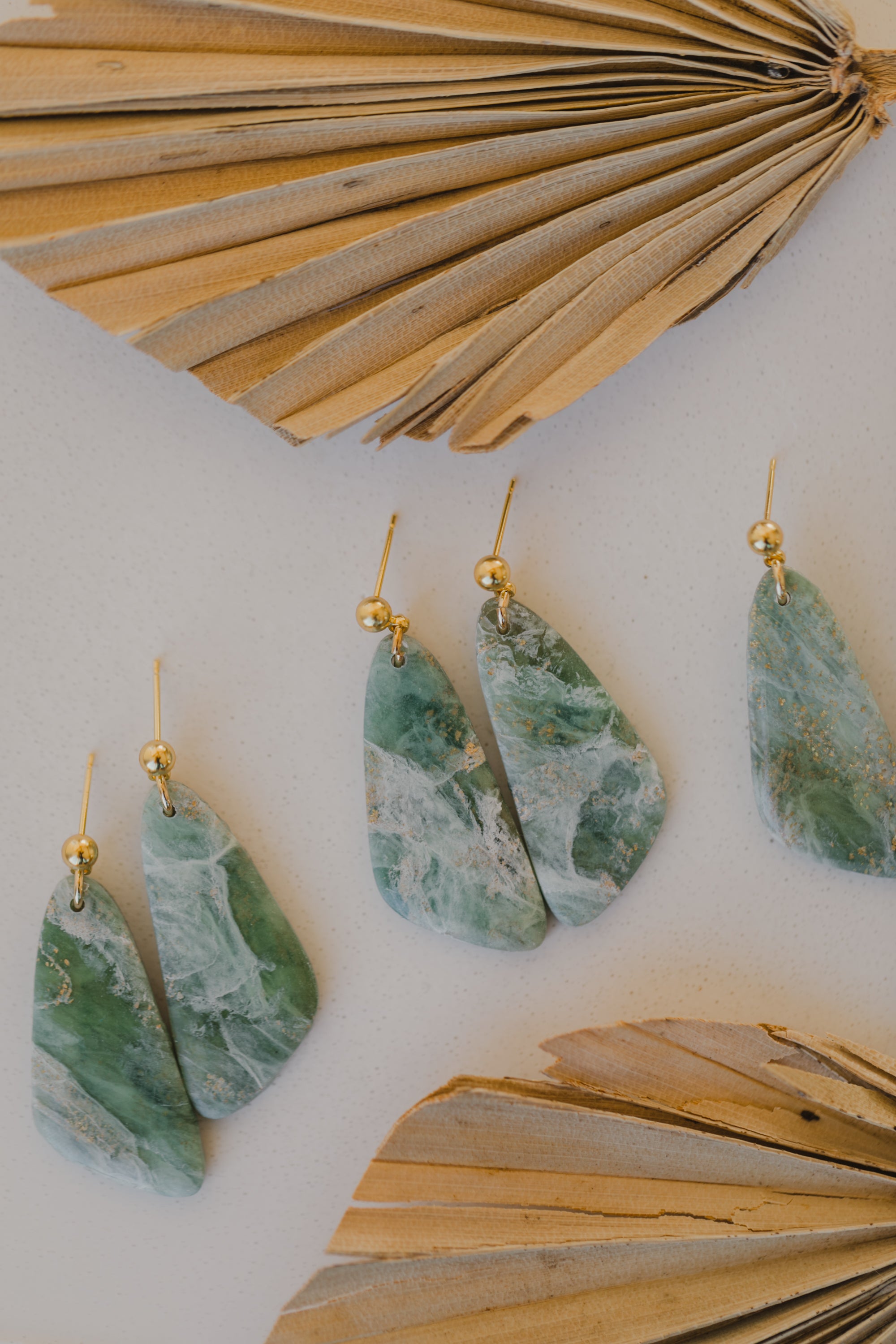 Polymer clay earrings in light green