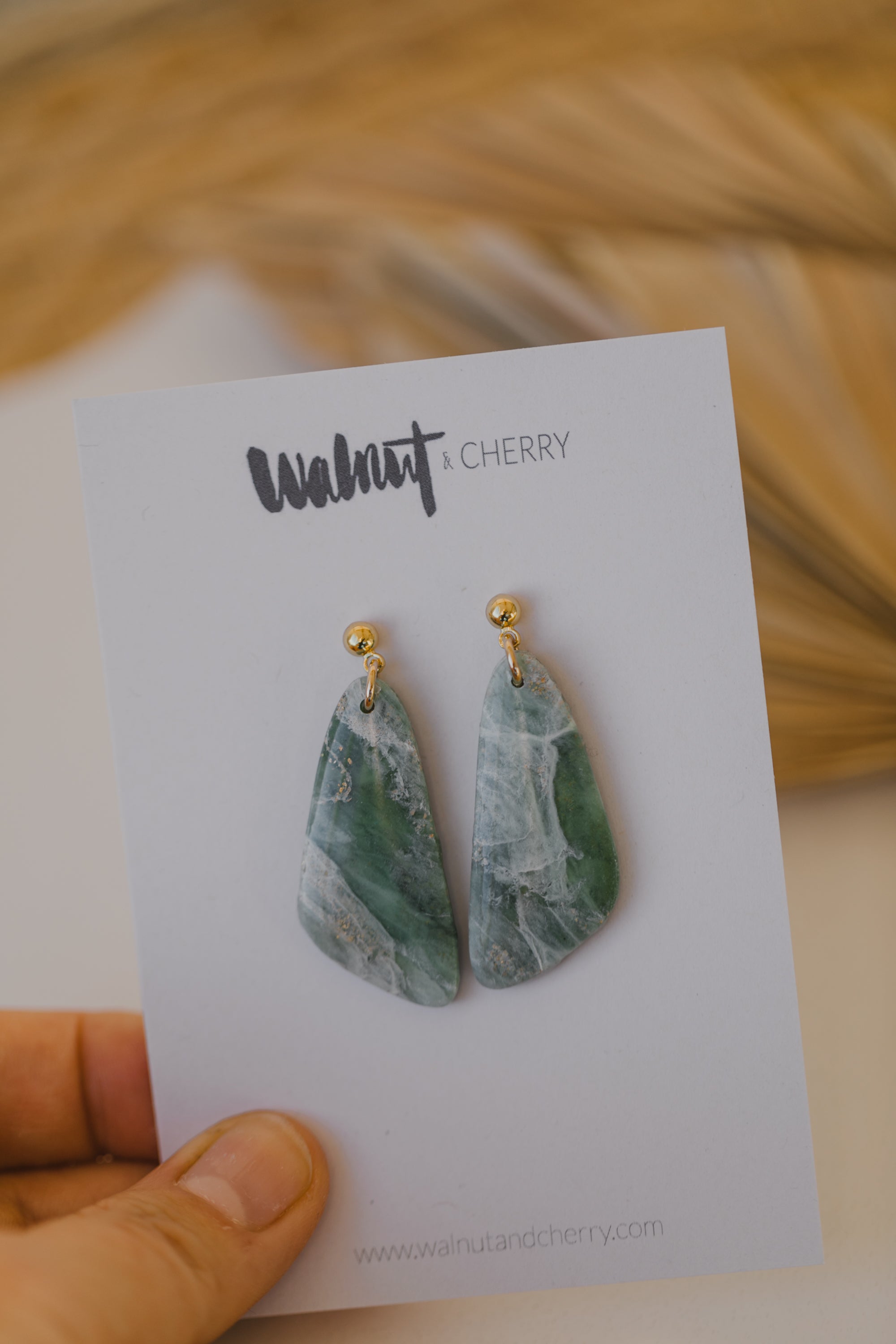 Polymer clay earrings in light green