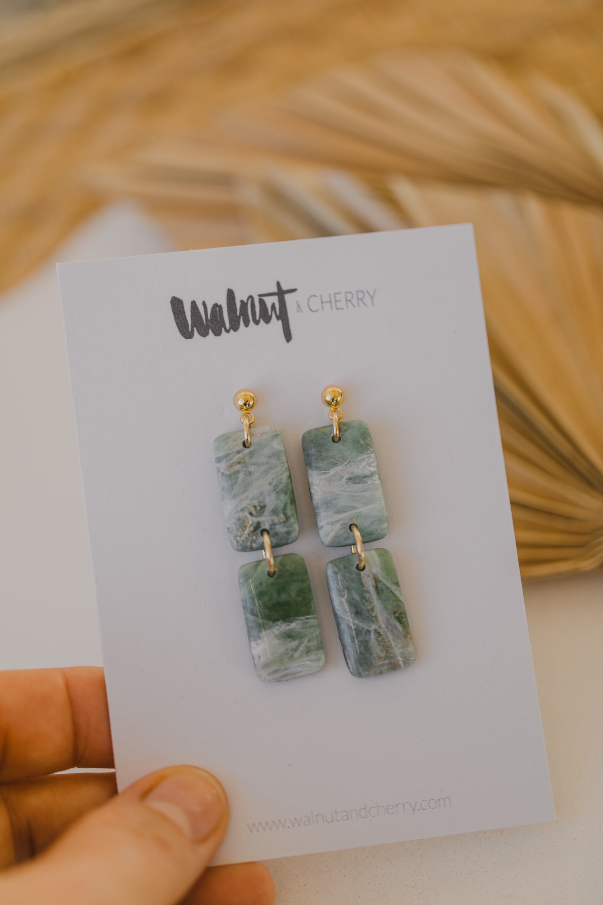 Polymer clay earrings in light green
