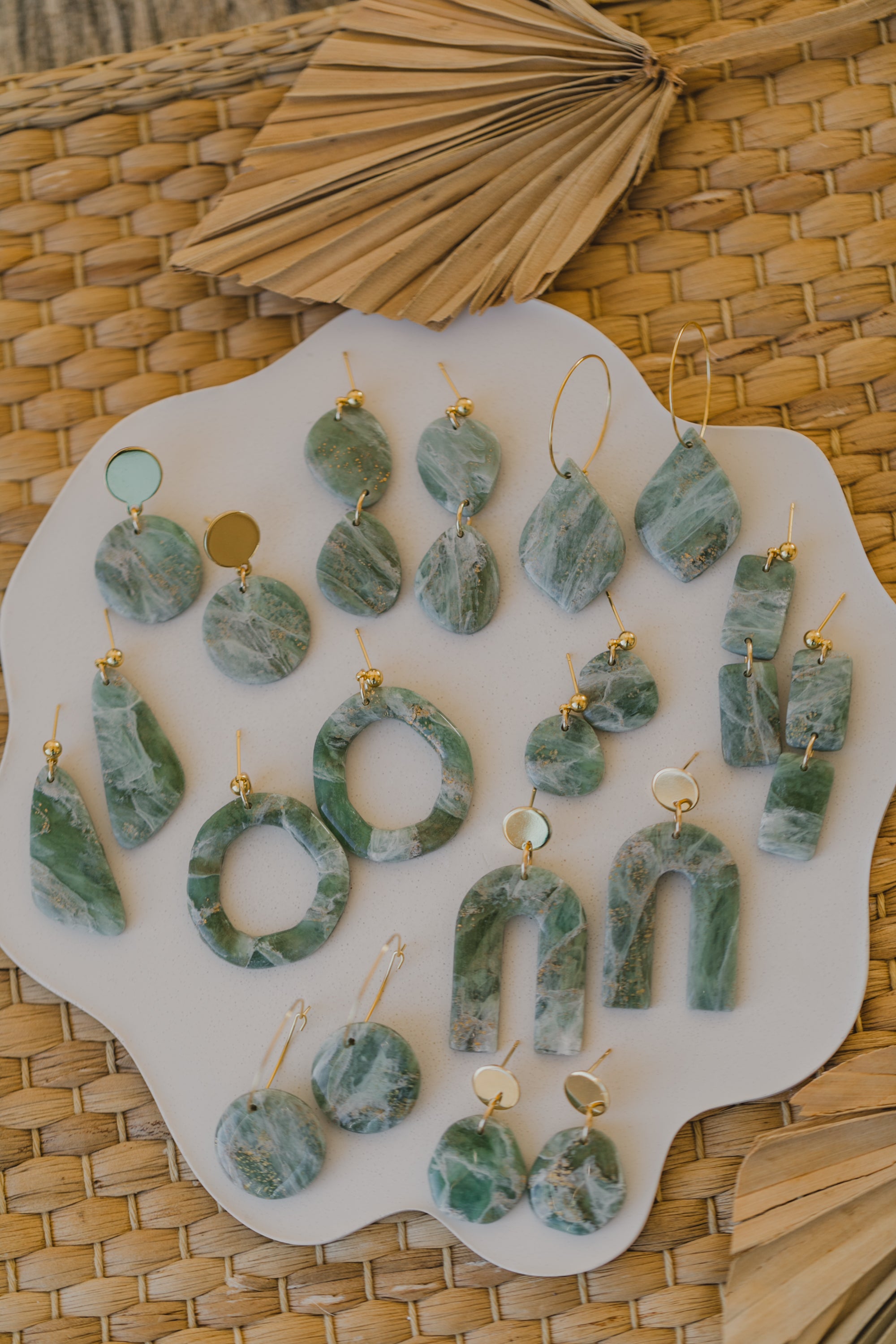 Polymer clay earrings in light green