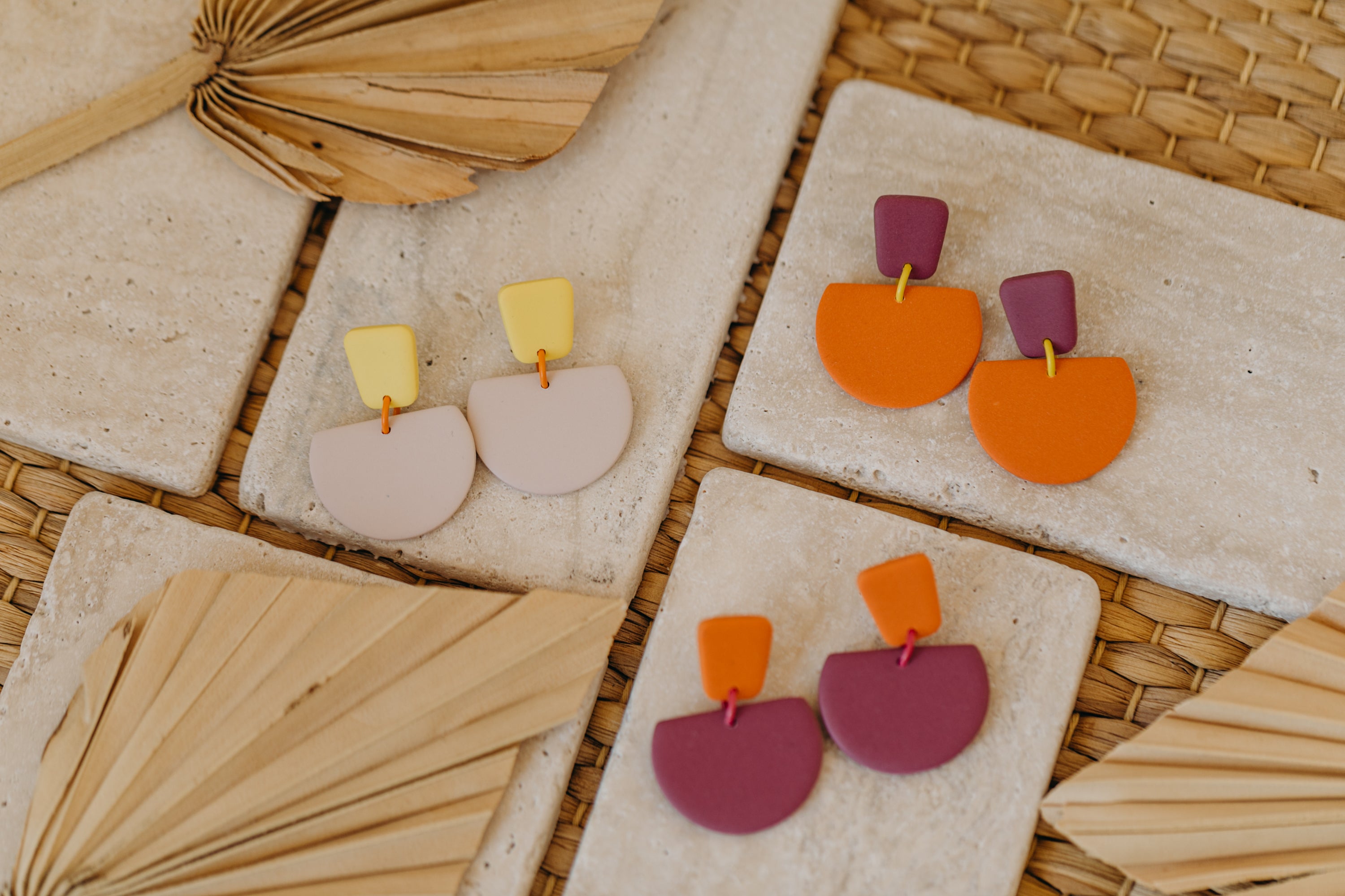 Hoop earrings with round polymer clay pendant and leaf