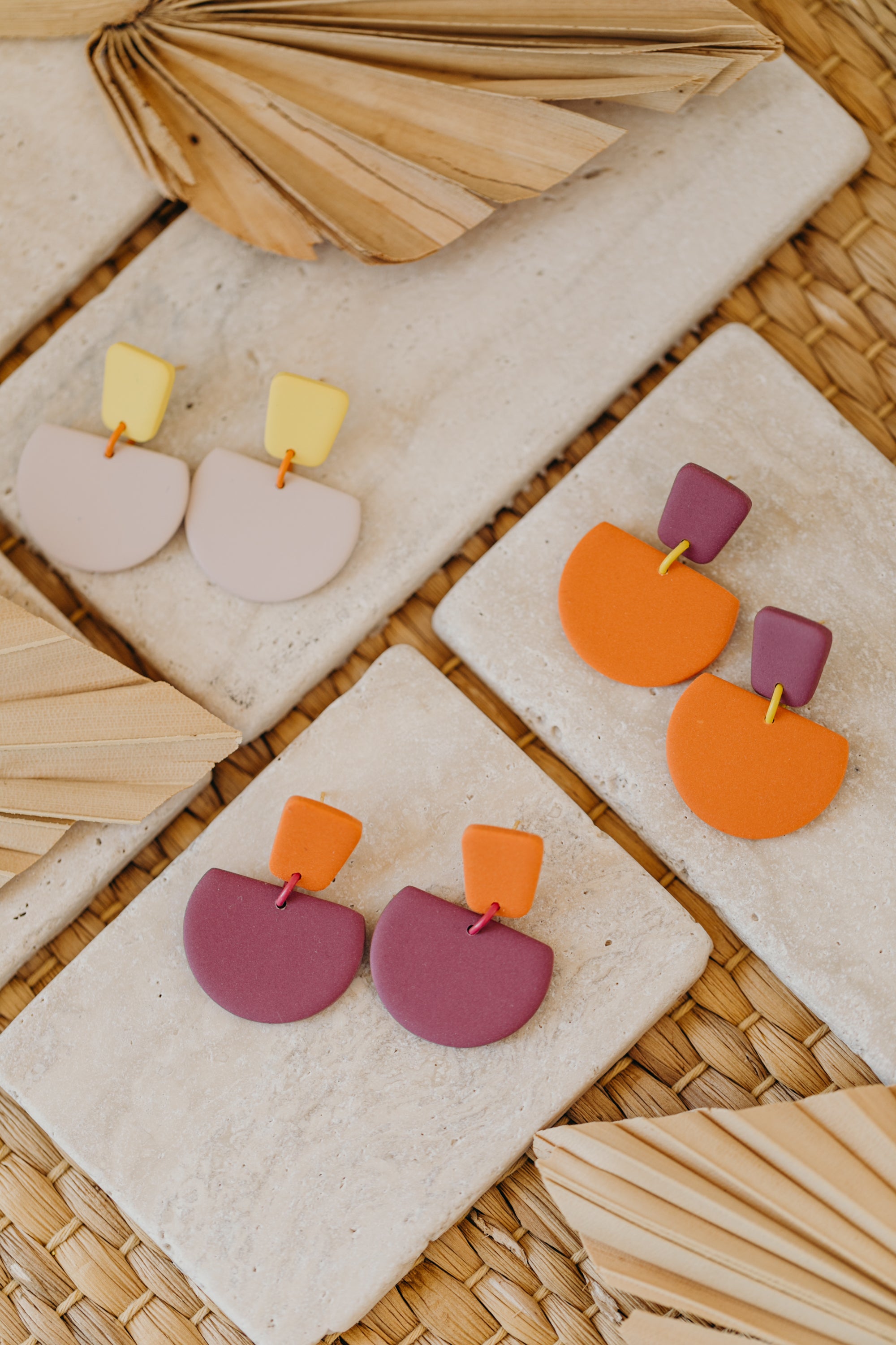 Hoop earrings with round polymer clay pendant and leaf