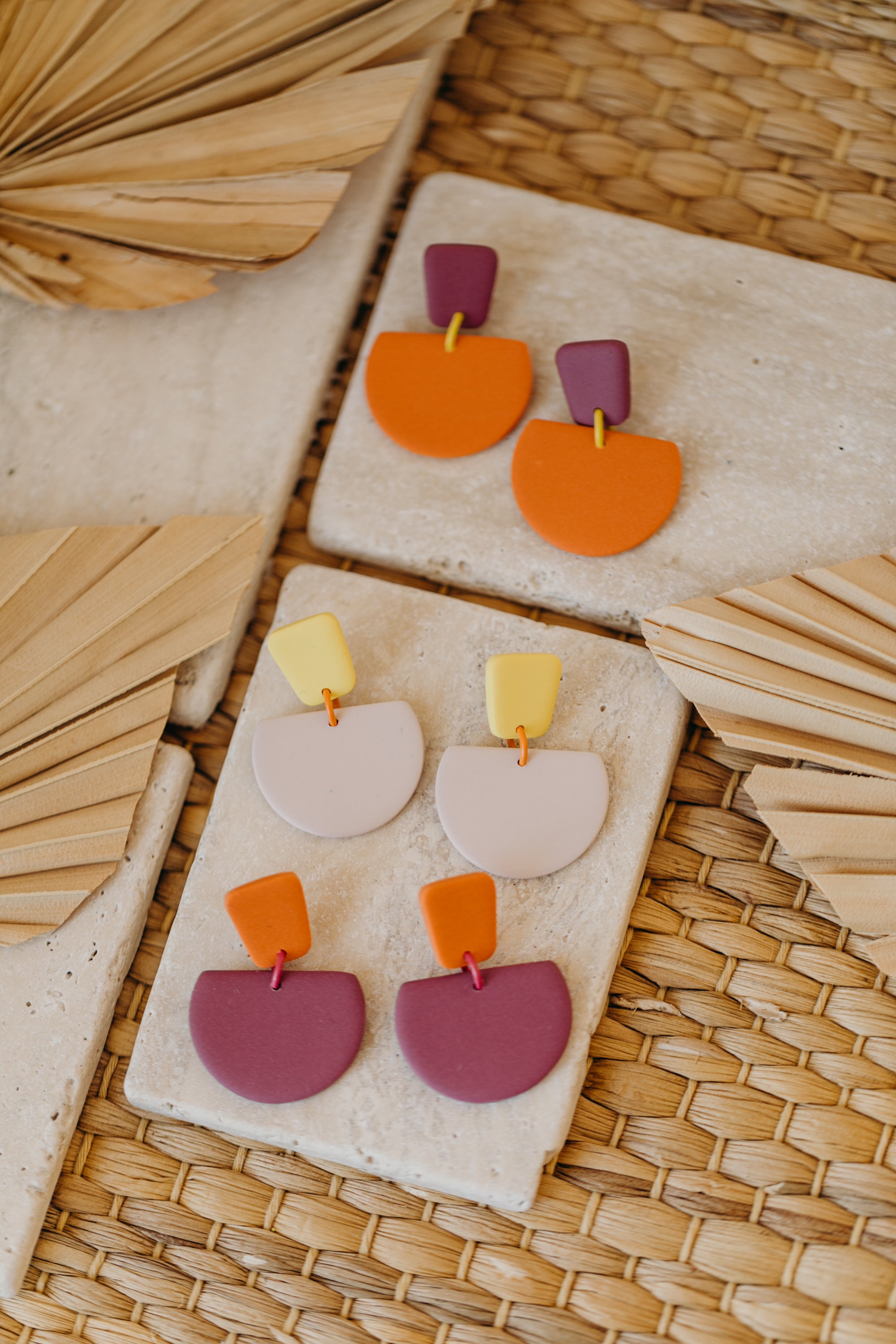 Hoop earrings with round polymer clay pendant and leaf