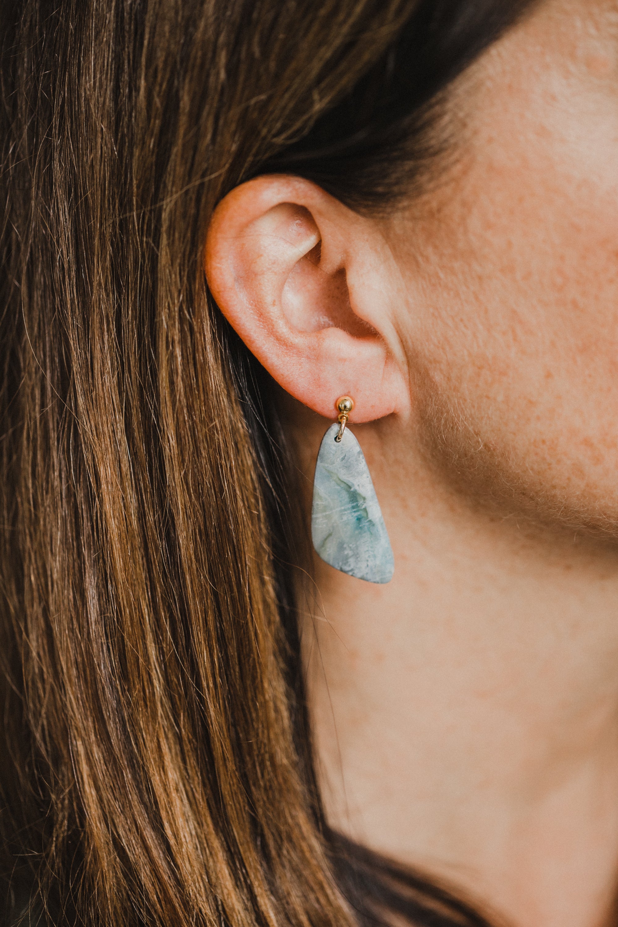 Hoop earrings with round polymer clay pendant and leaf