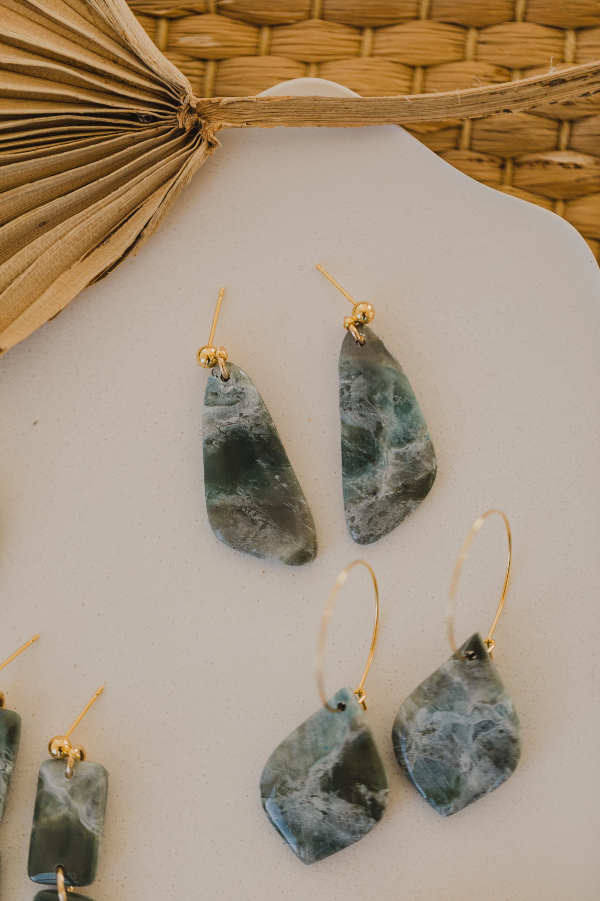 Hoop earrings with round polymer clay pendant and leaf