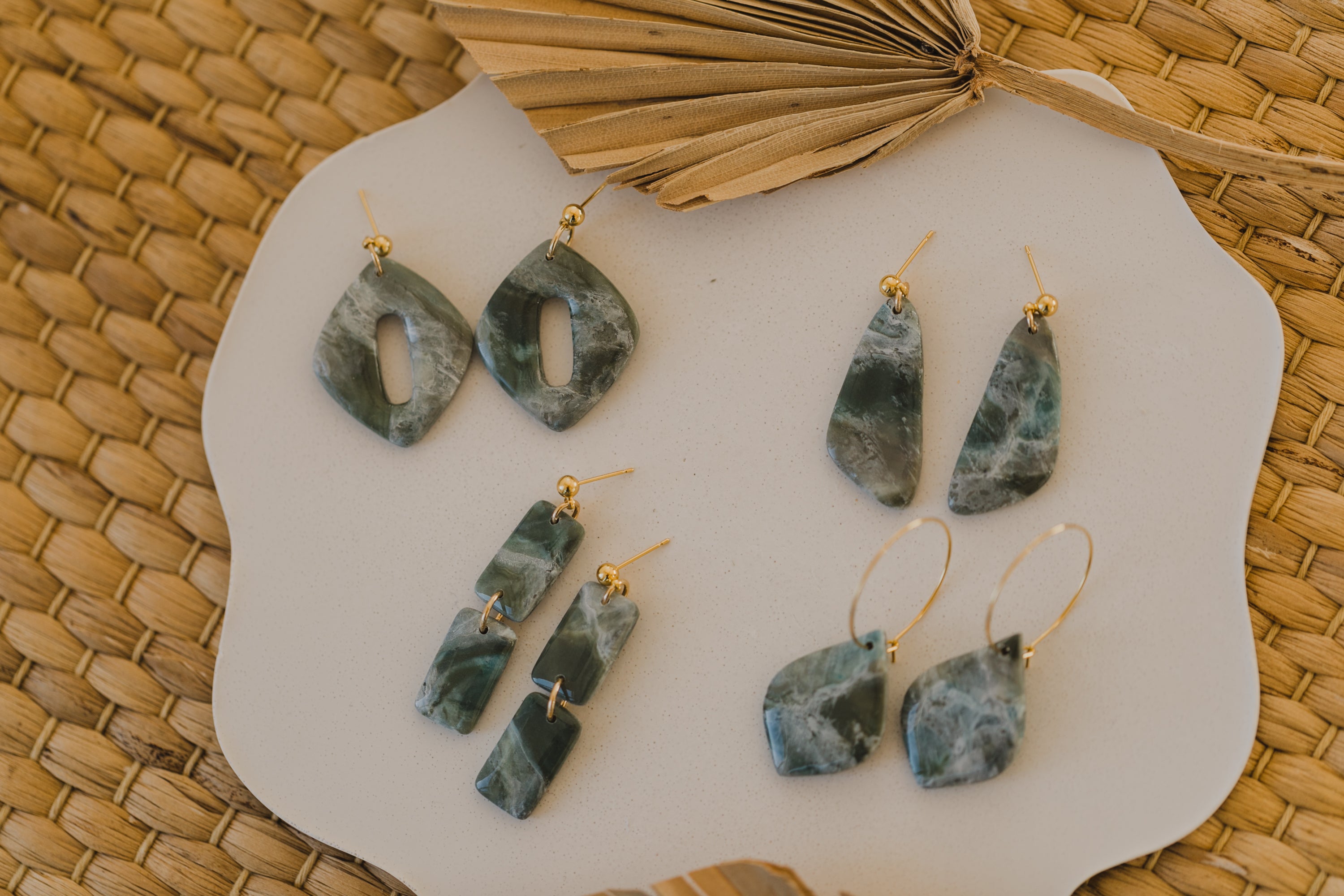 Hoop earrings with round polymer clay pendant and leaf