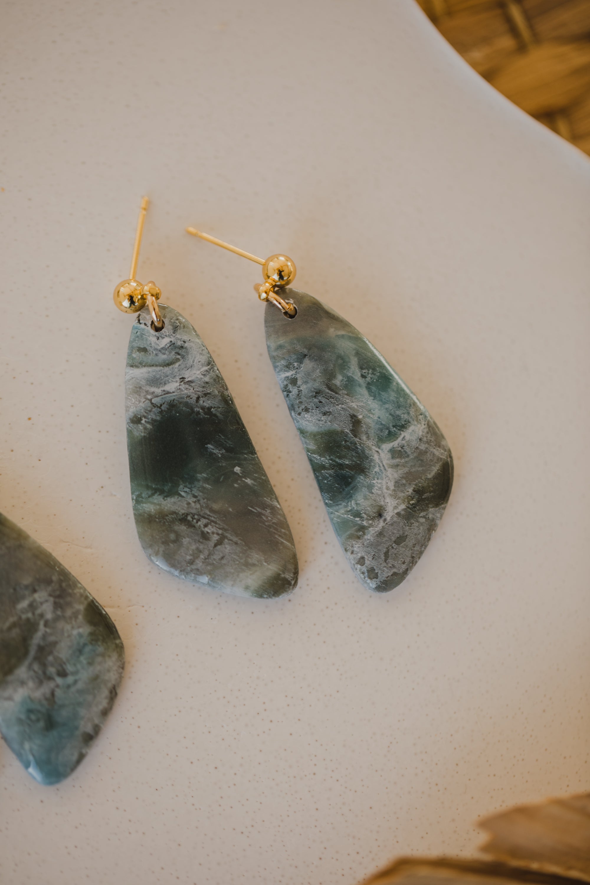 Hoop earrings with round polymer clay pendant and leaf