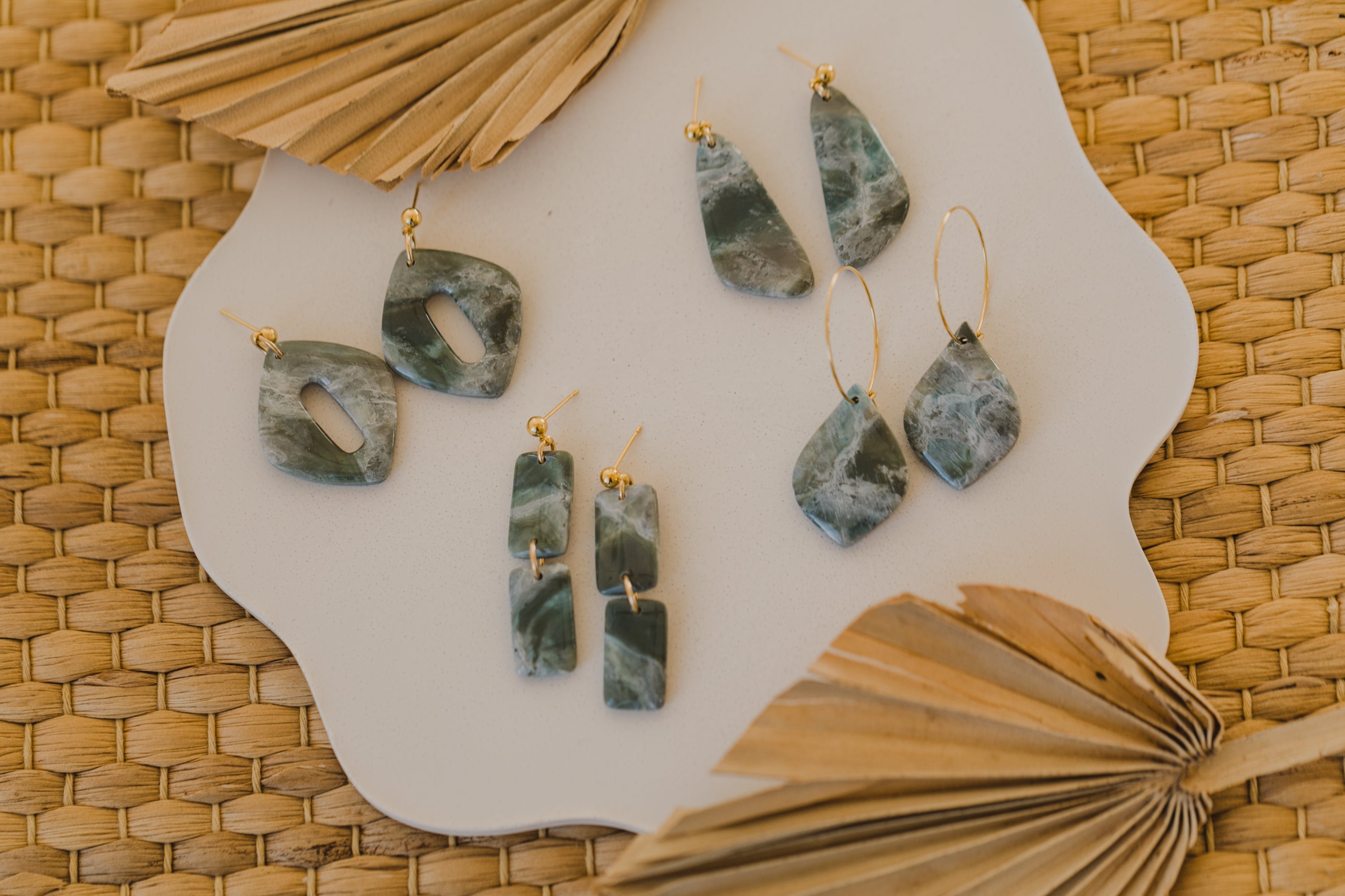 Hoop earrings with round polymer clay pendant and leaf