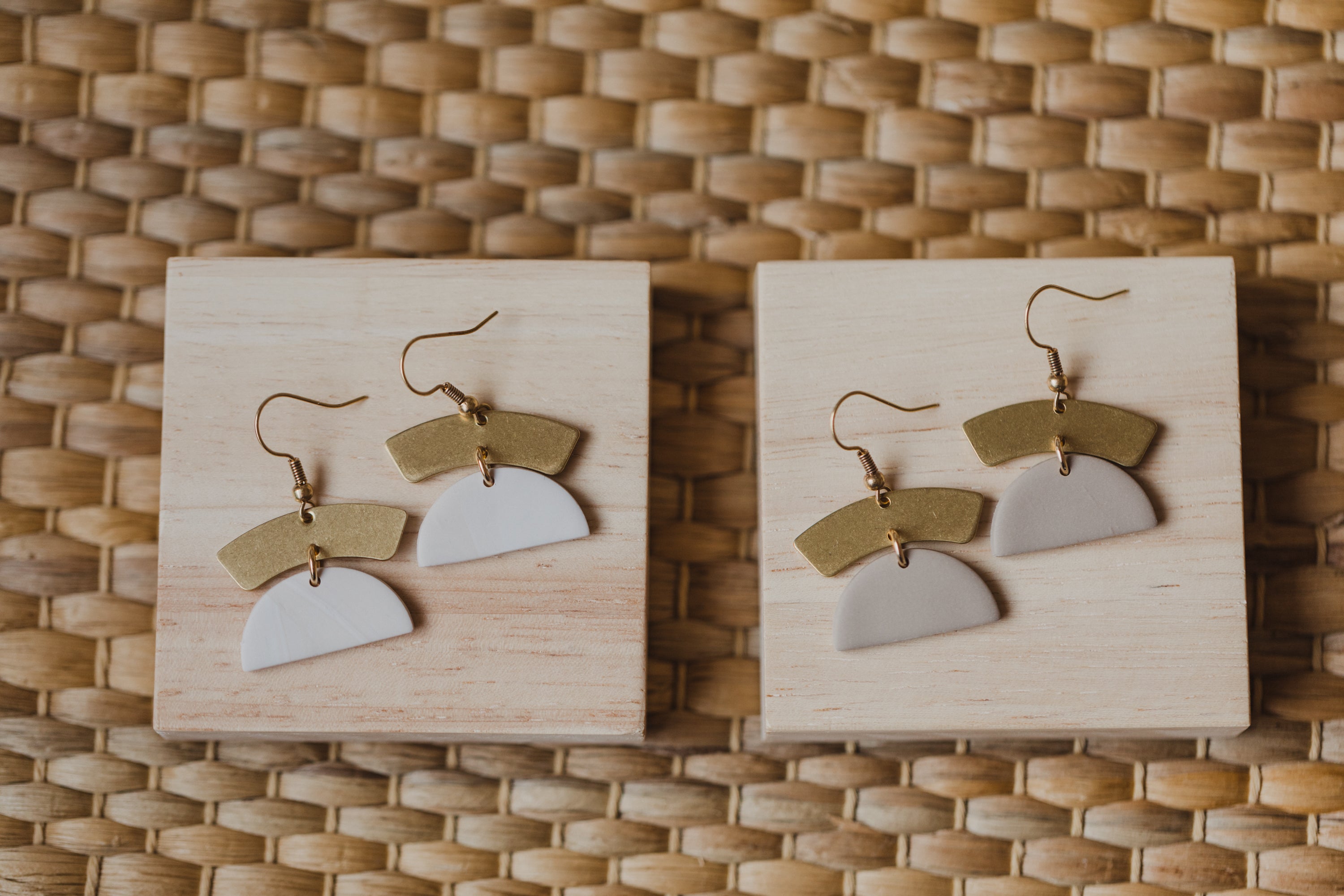 golden earrings with acrylic in white, petrol and brown