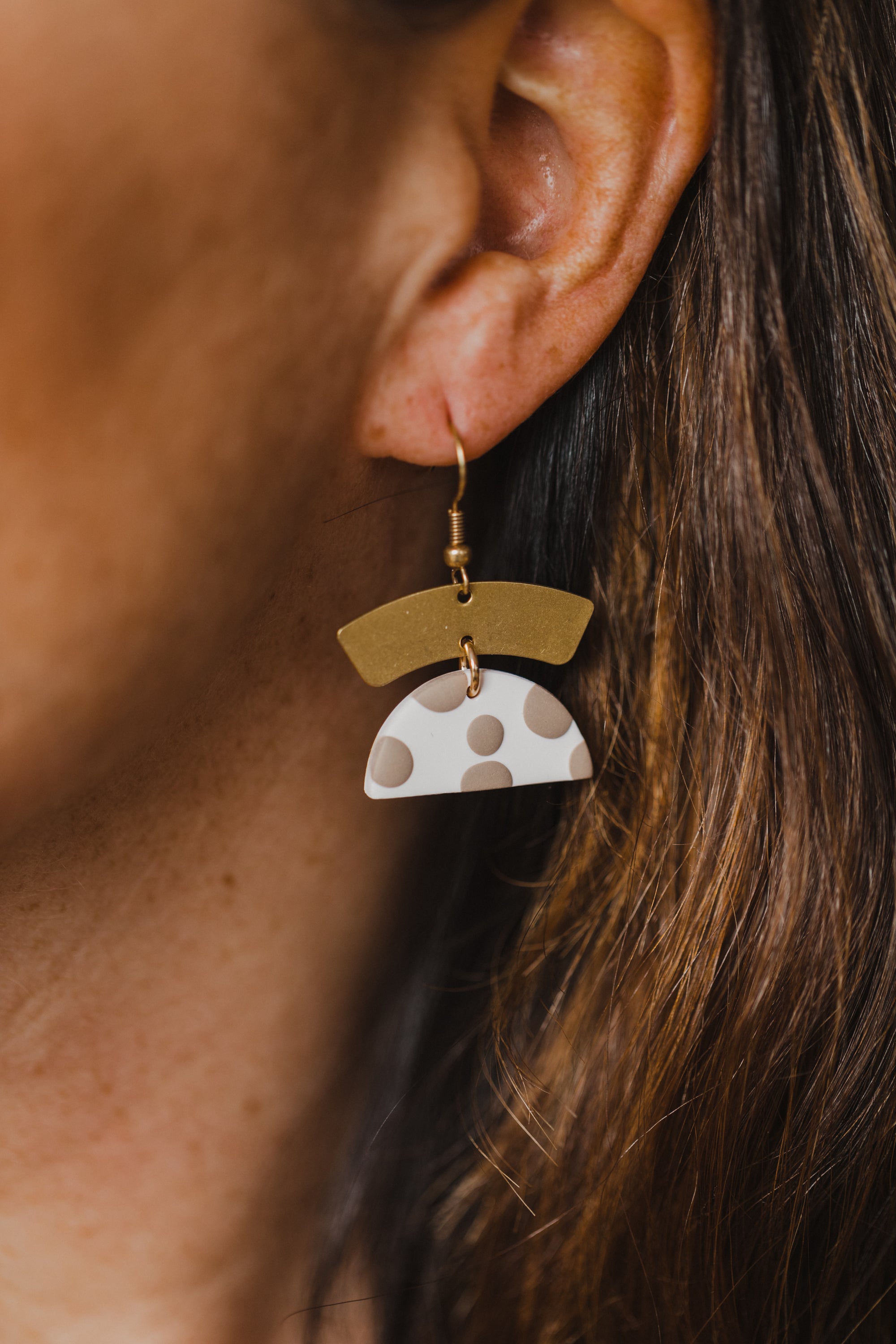 golden earrings with acrylic in white, petrol and brown