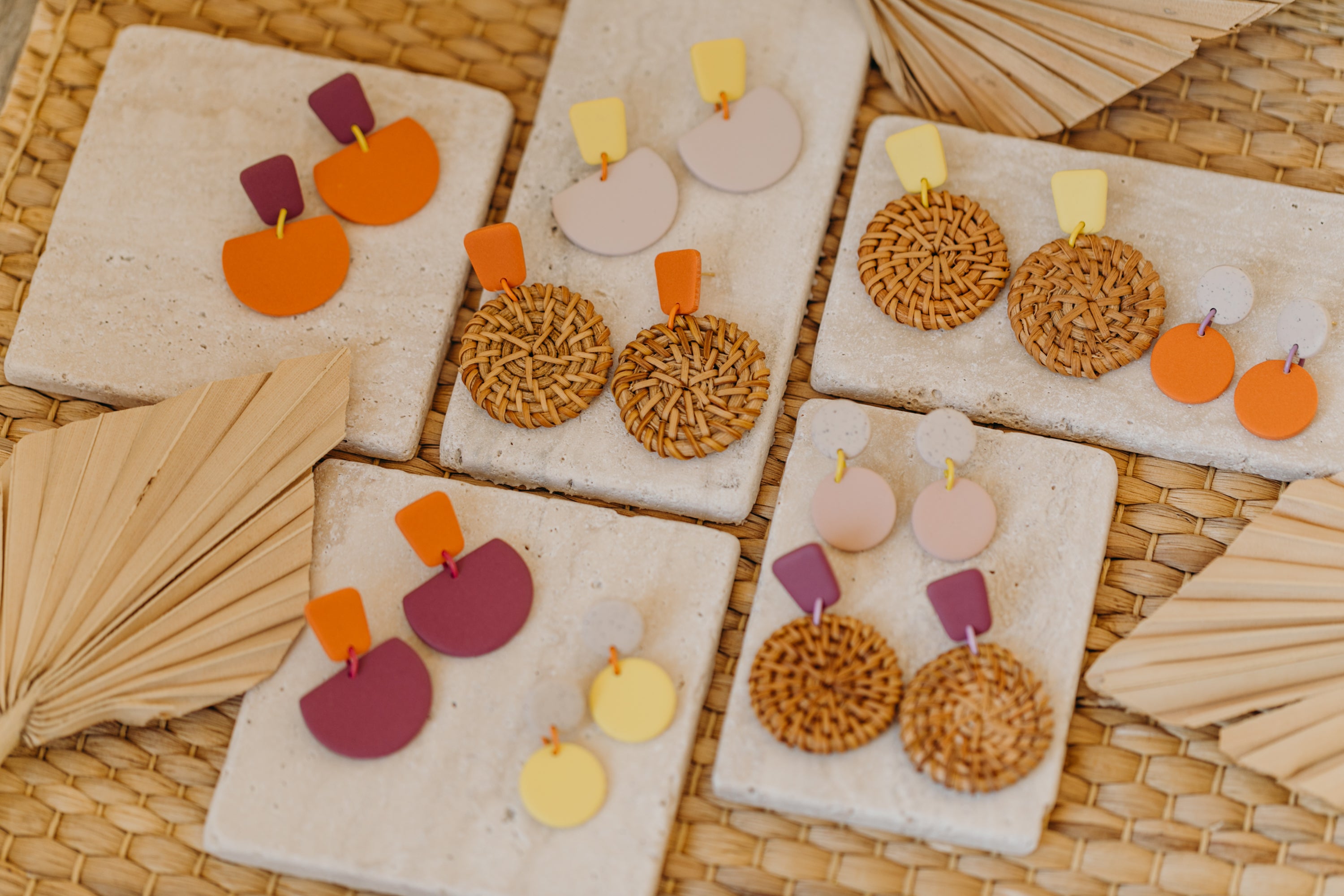 Hoop earrings with round polymer clay pendant and leaf