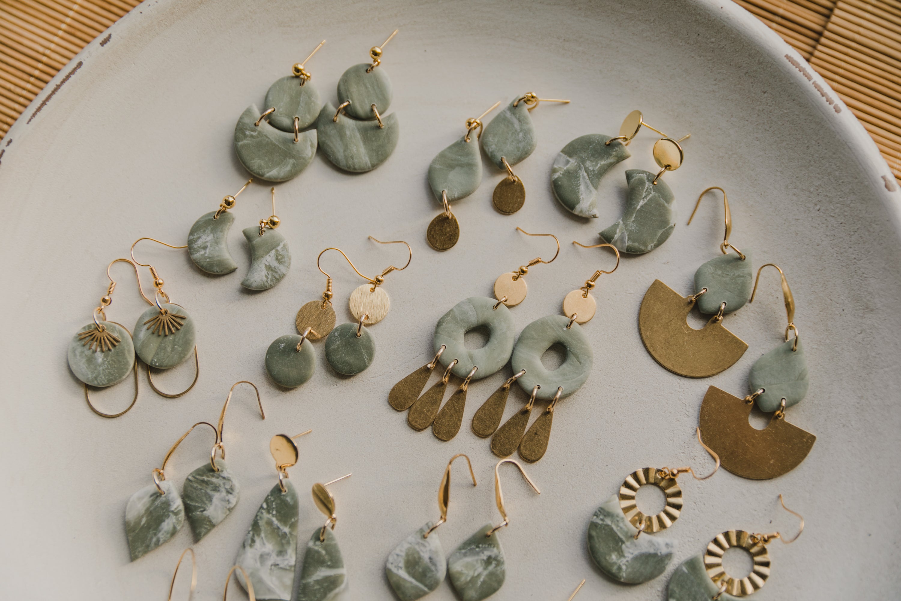 Hoop earrings with round polymer clay pendant and leaf