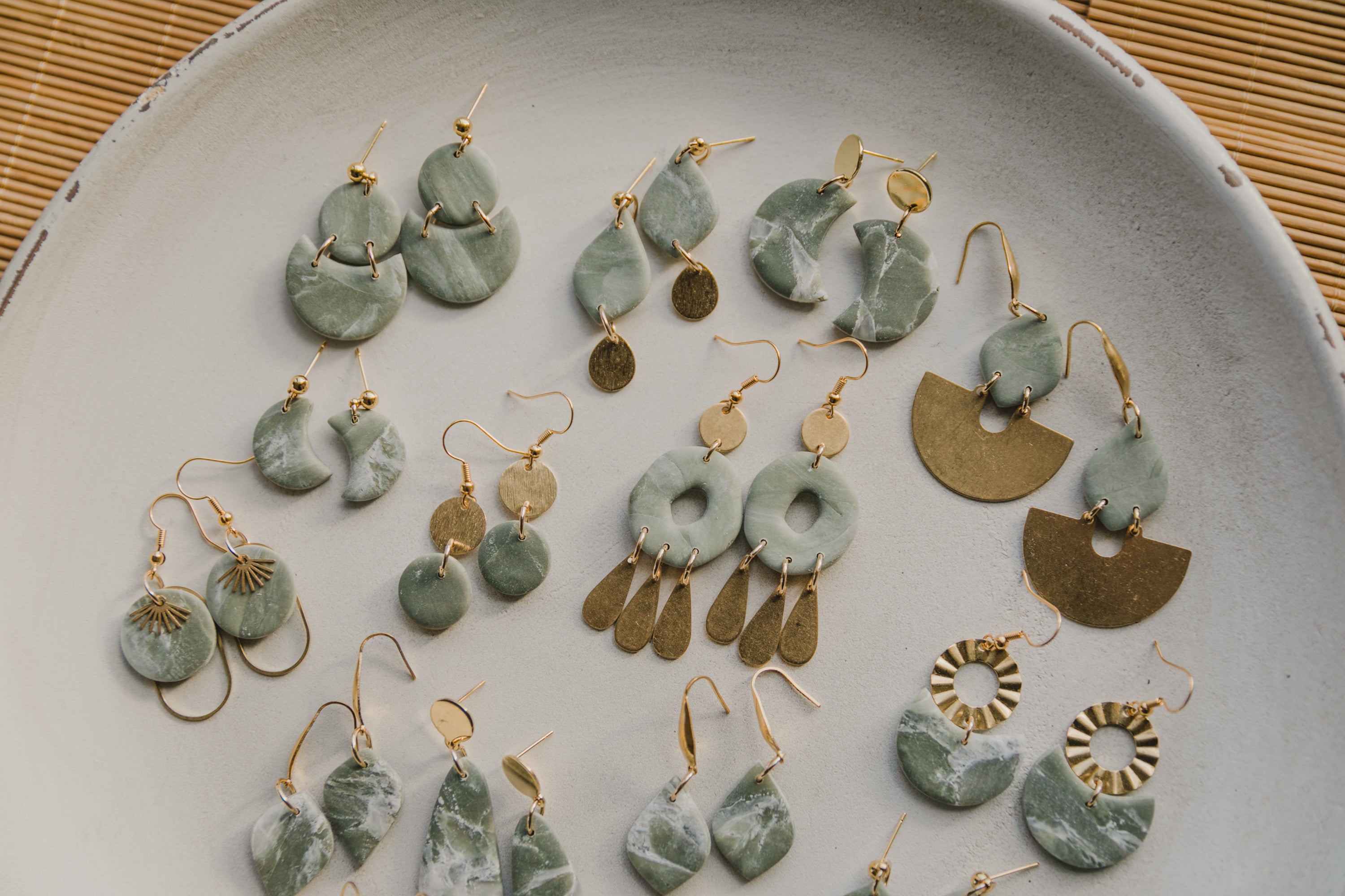 Hoop earrings with round polymer clay pendant and leaf