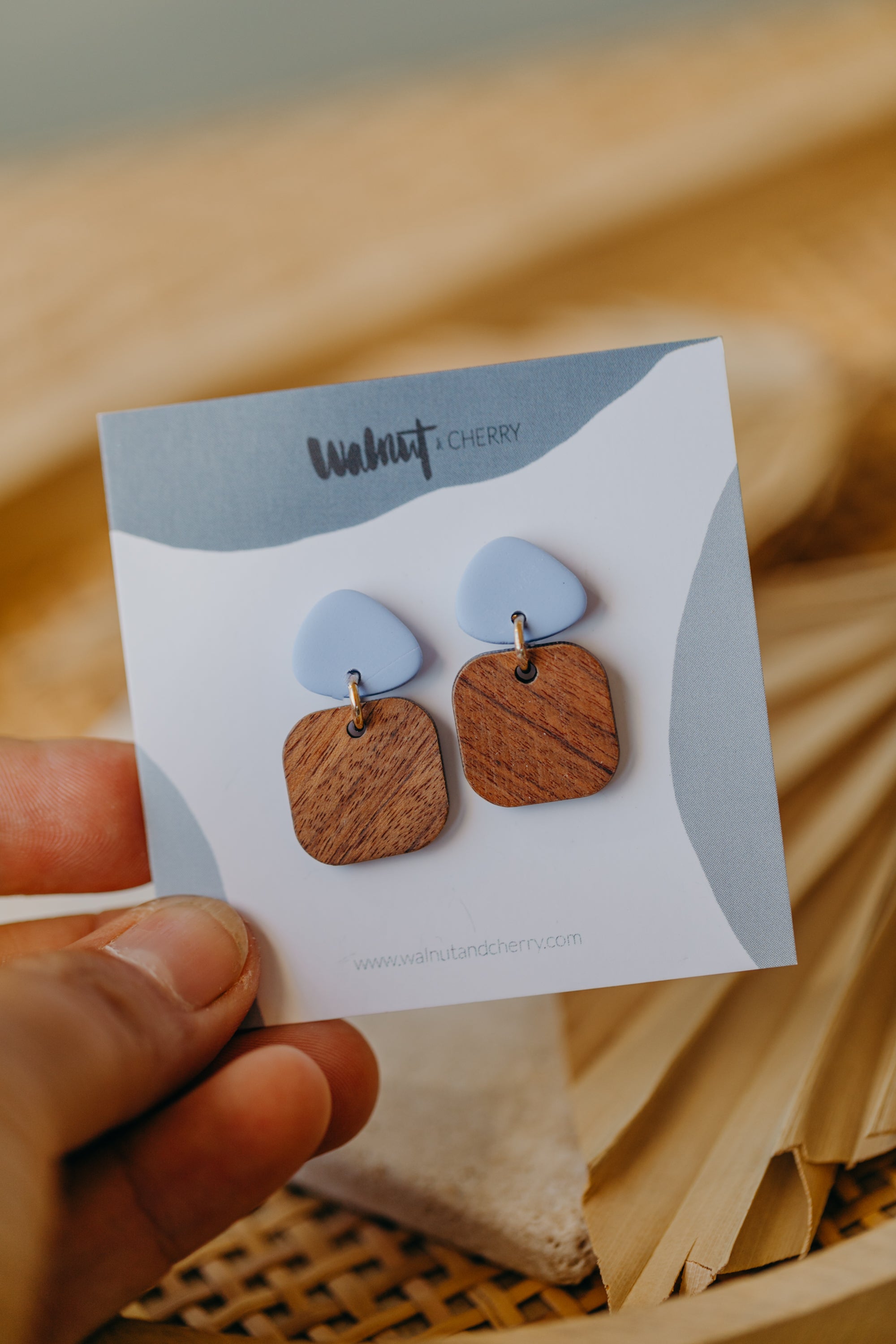 CARLA - triangular polymer clay earrings in pastel blue with rectangular wooden pendant