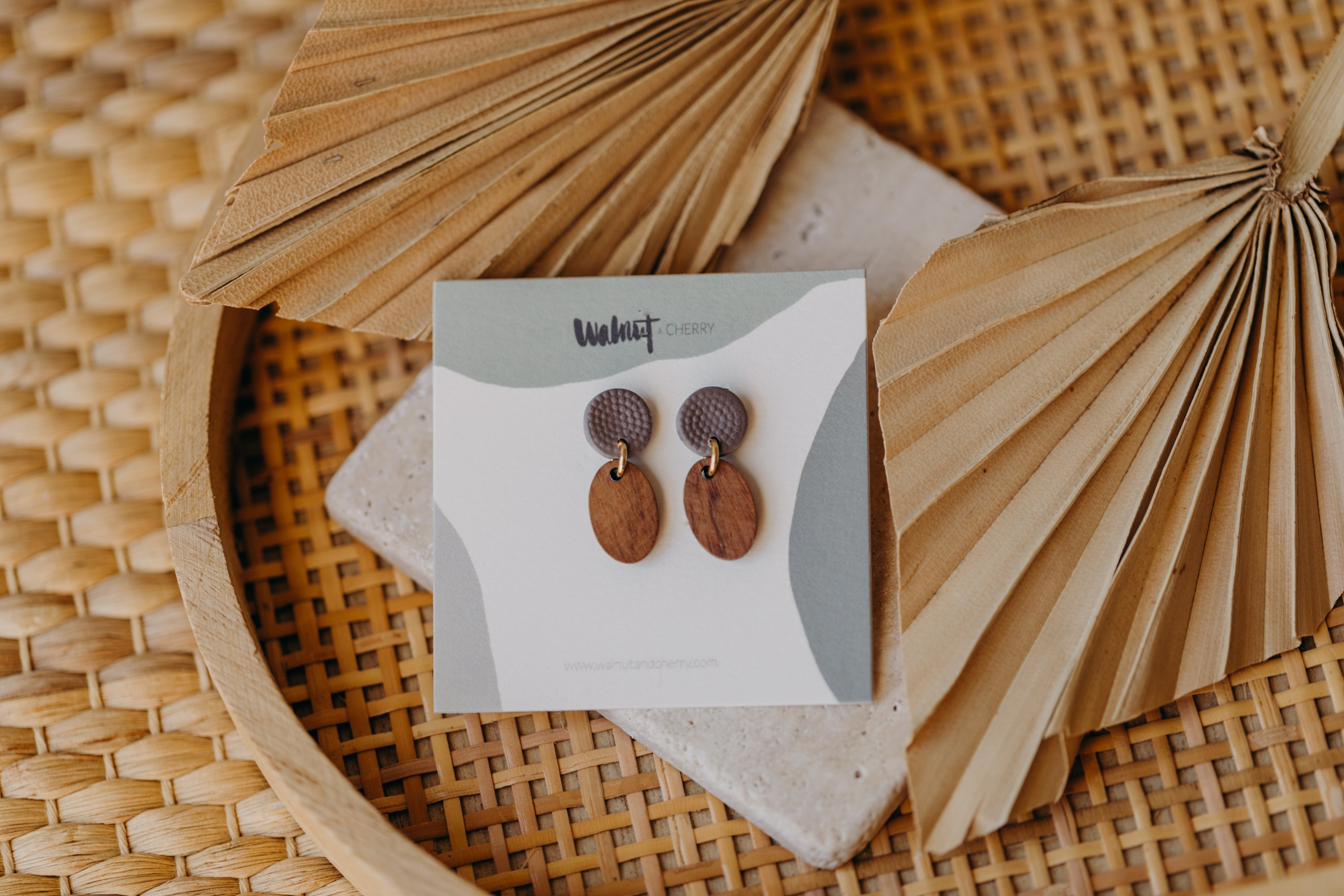 round polymer clay earrings in mauve with oval wooden pendant