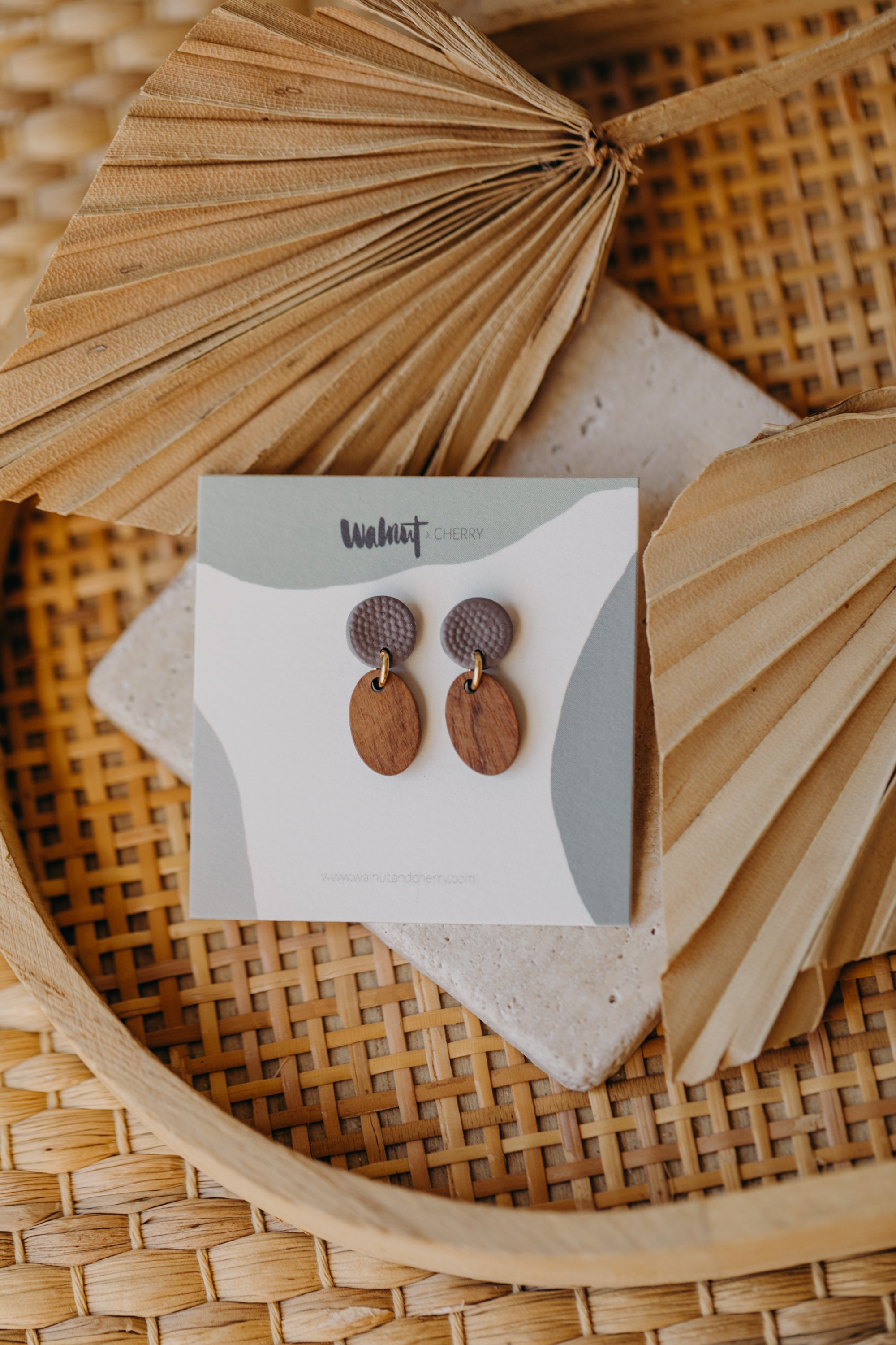 round polymer clay earrings in mauve with oval wooden pendant