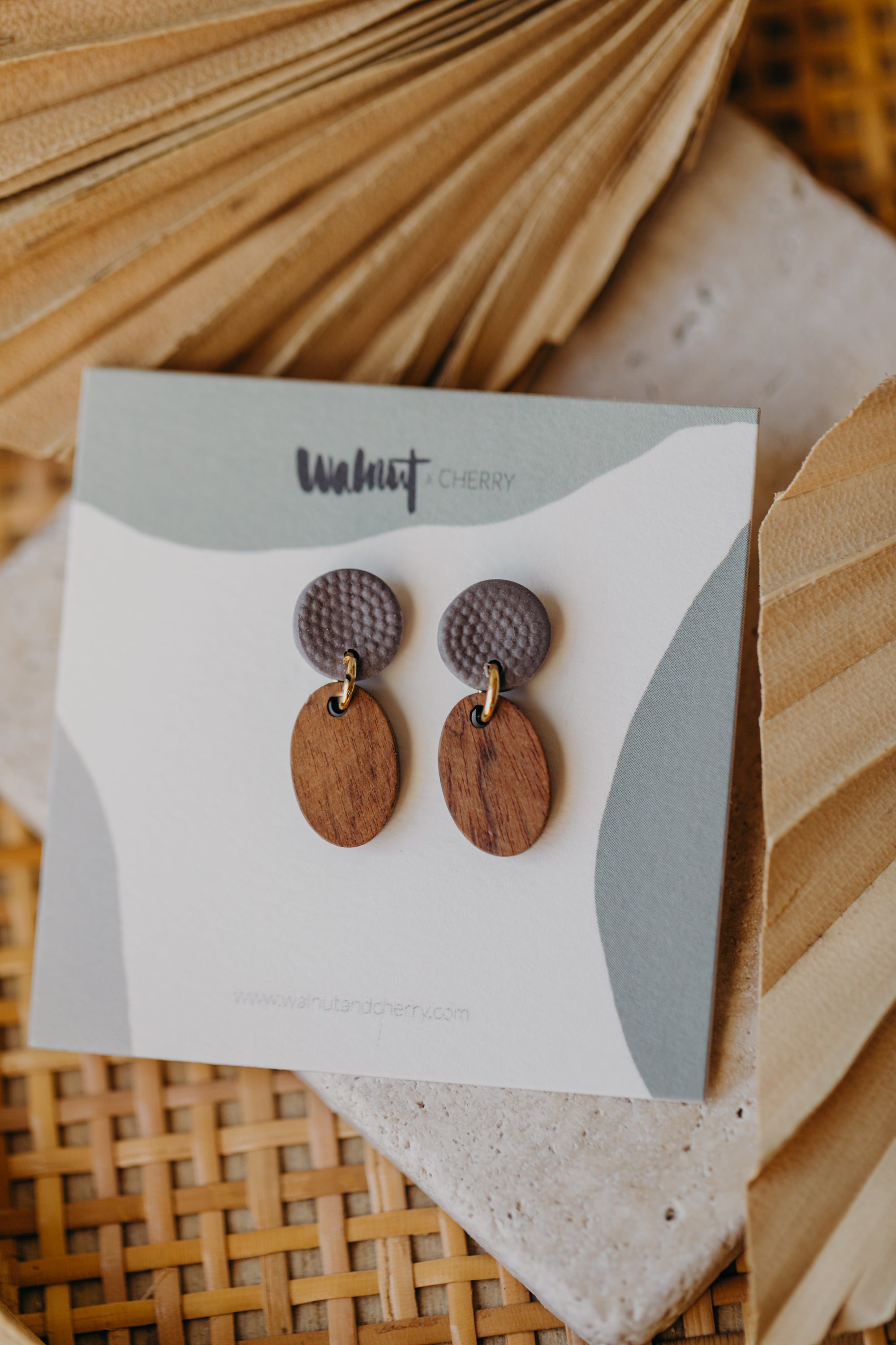 round polymer clay earrings in mauve with oval wooden pendant