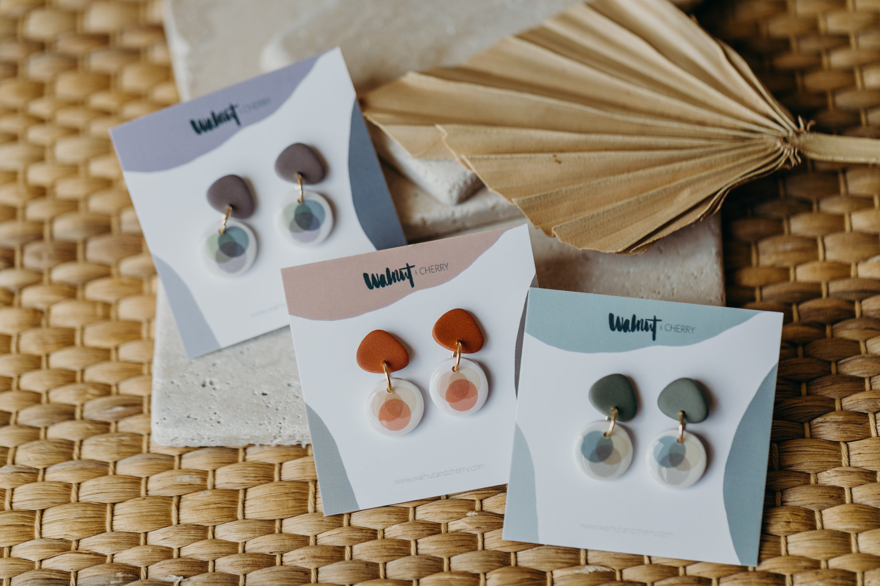 small polymer clay earrings with colorful dots