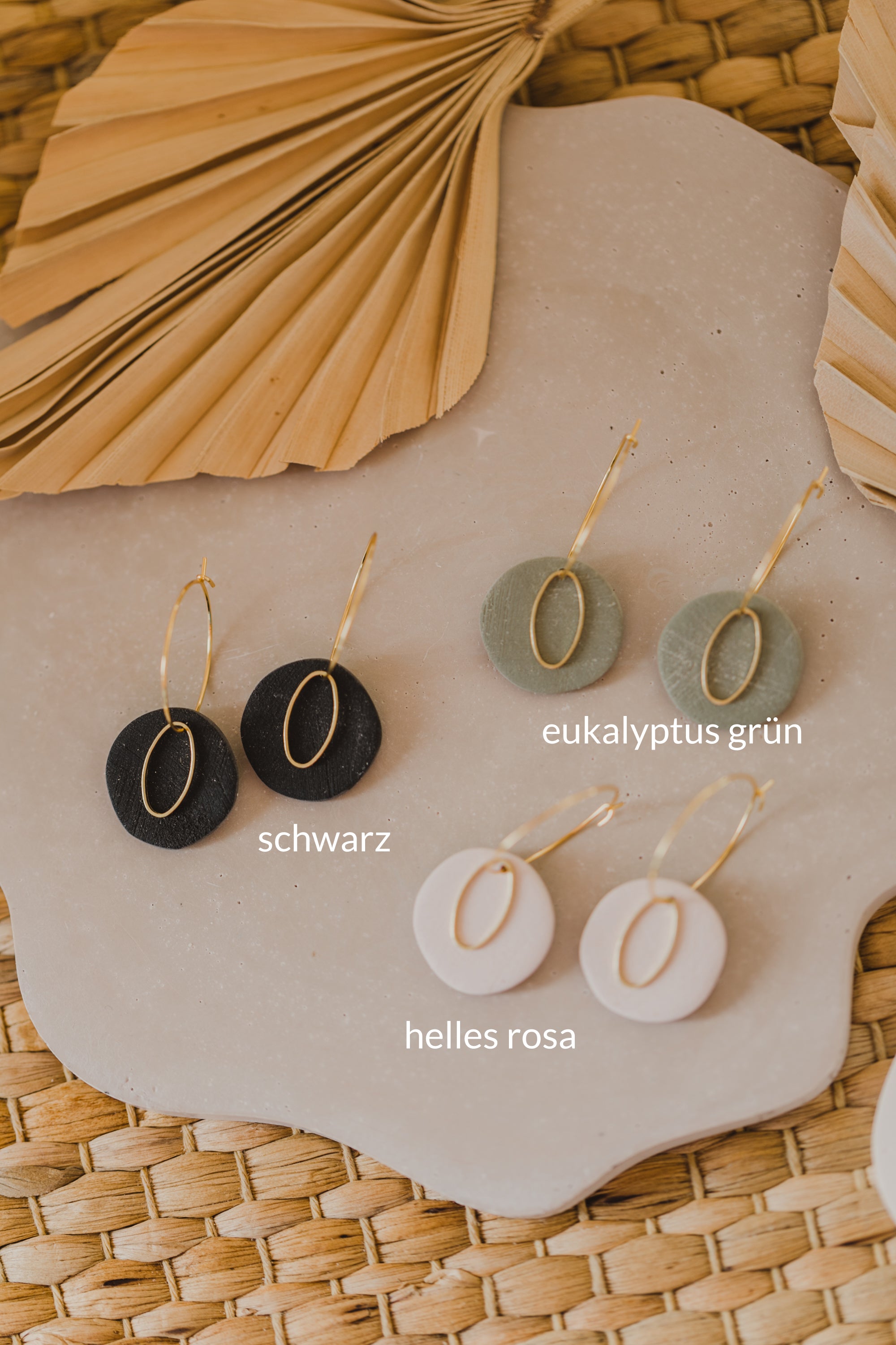 Hoop earrings with round polymer clay pendant and leaf