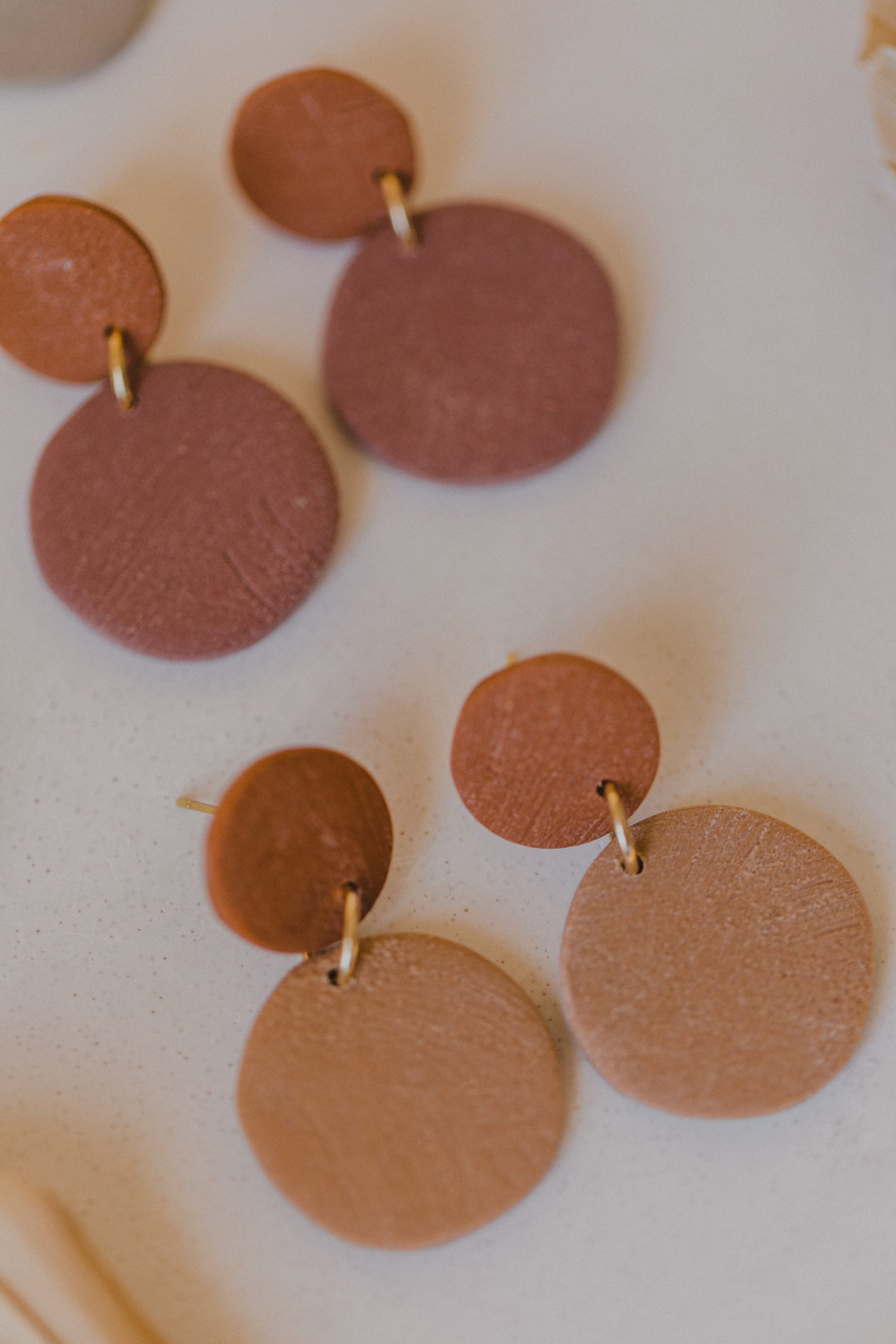 round earrings made of polymer clay in autumn colors