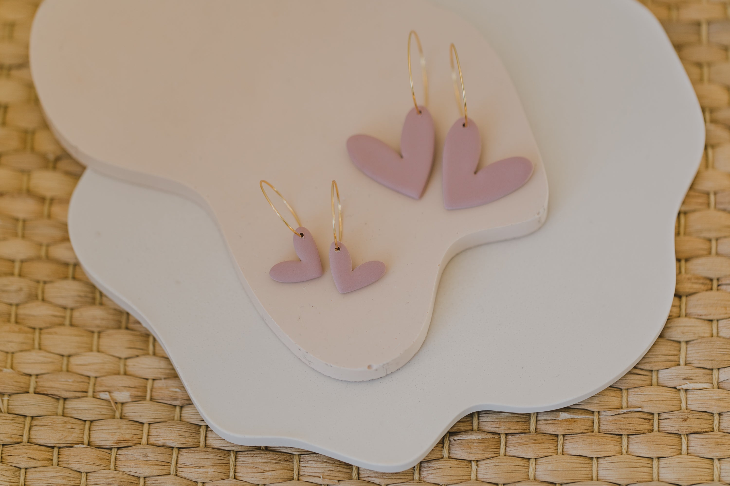 Hoop earrings with round polymer clay pendant and leaf