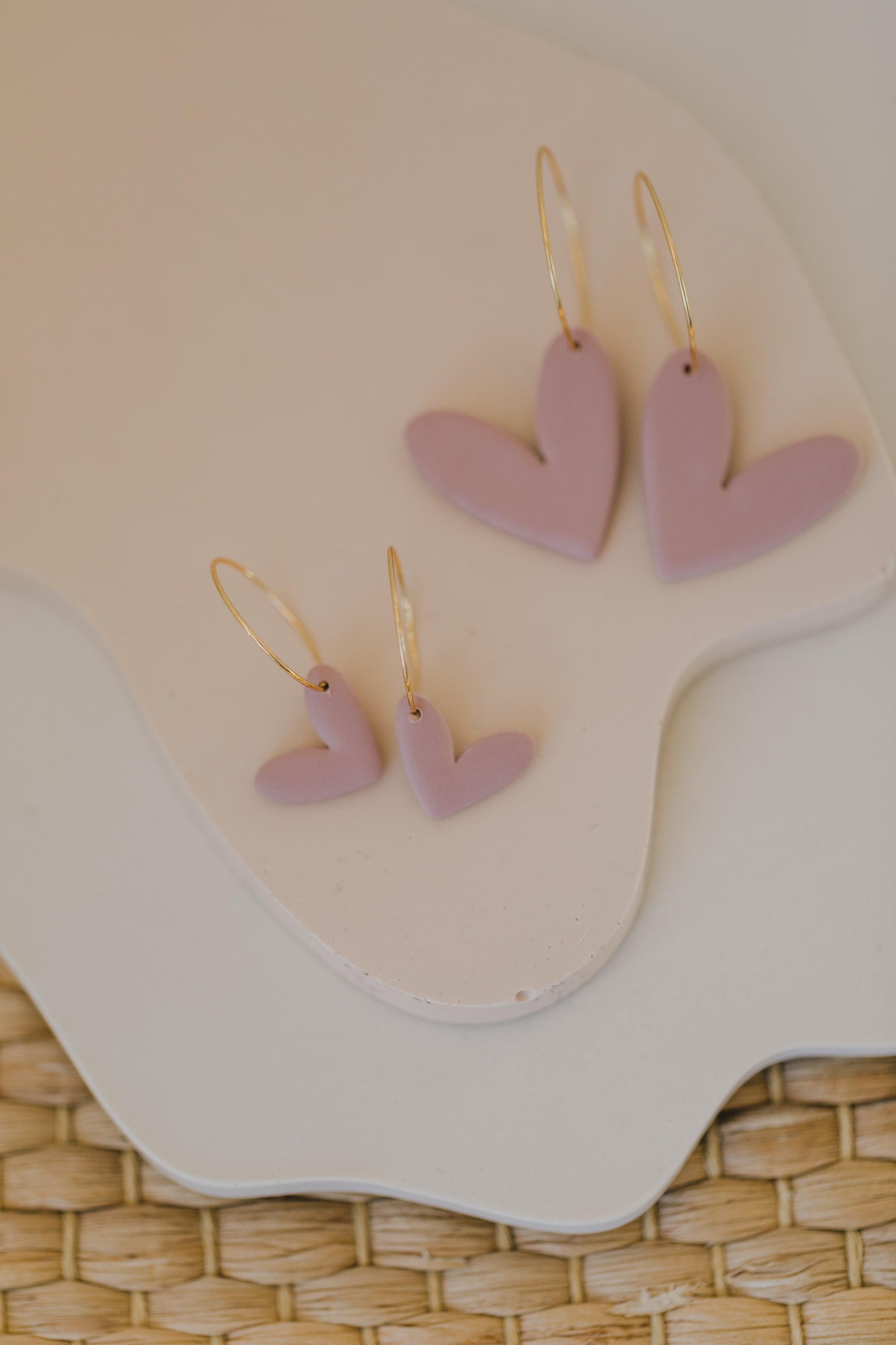 Hoop earrings with round polymer clay pendant and leaf