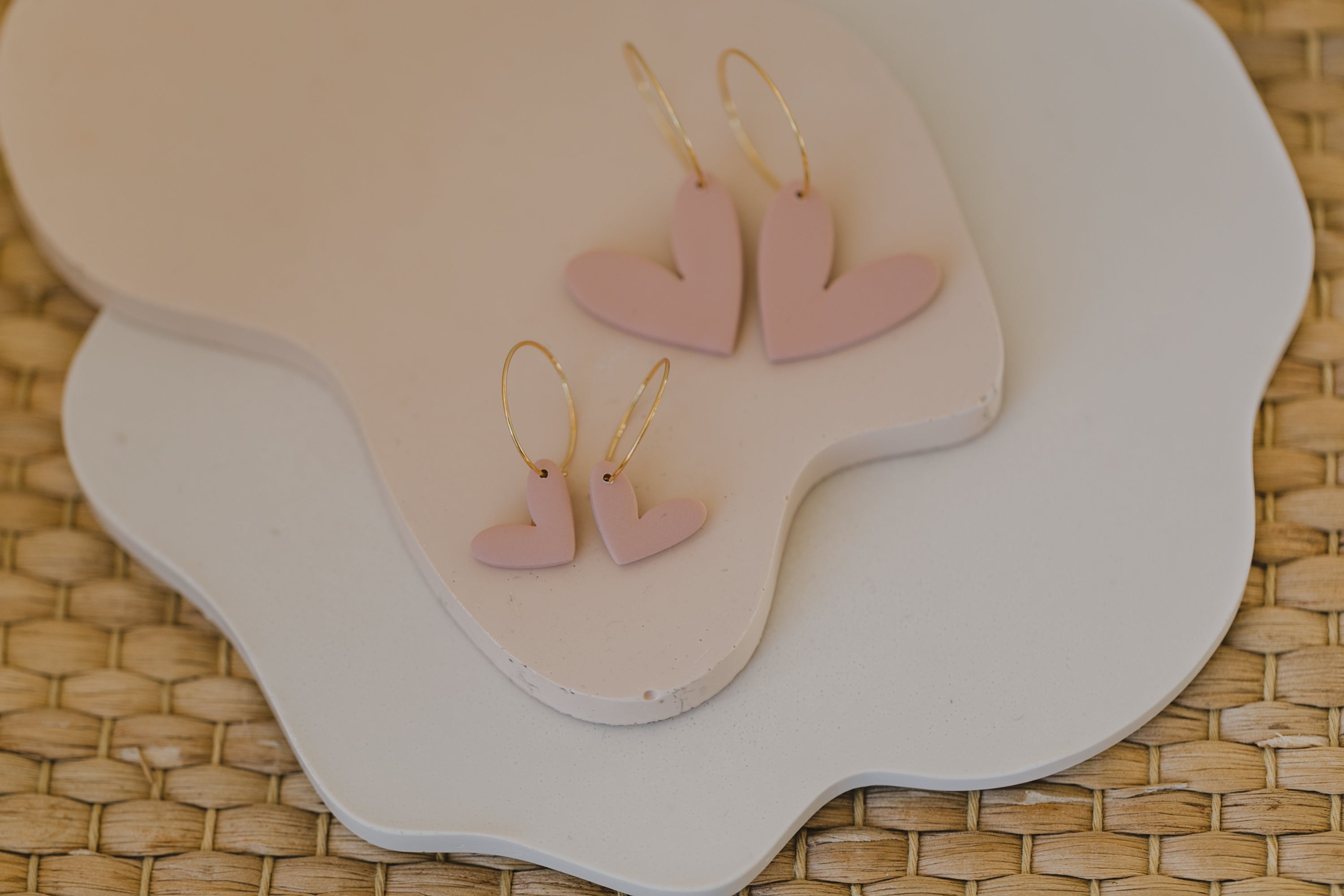 Hoop earrings with round polymer clay pendant and leaf