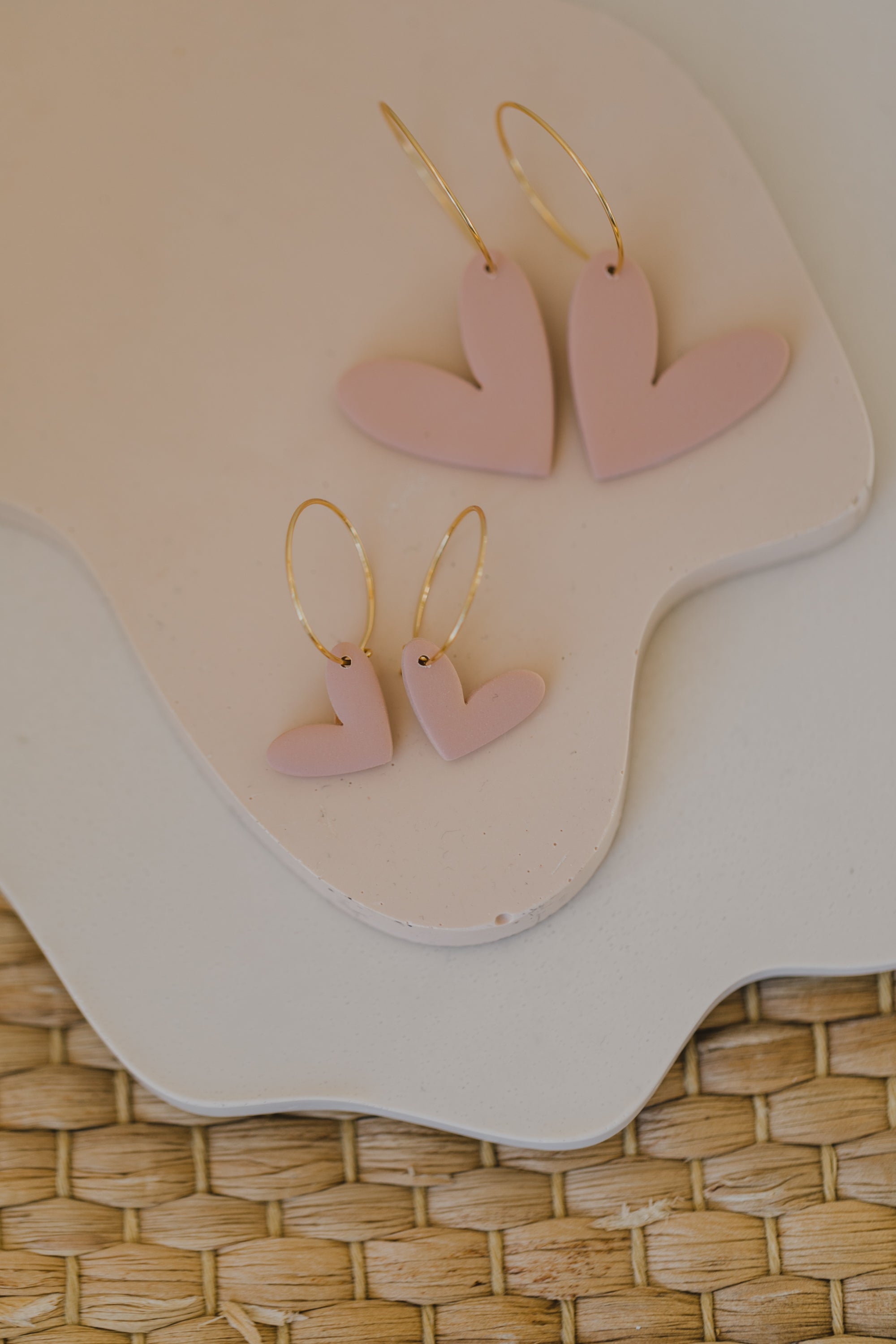 Hoop earrings with round polymer clay pendant and leaf