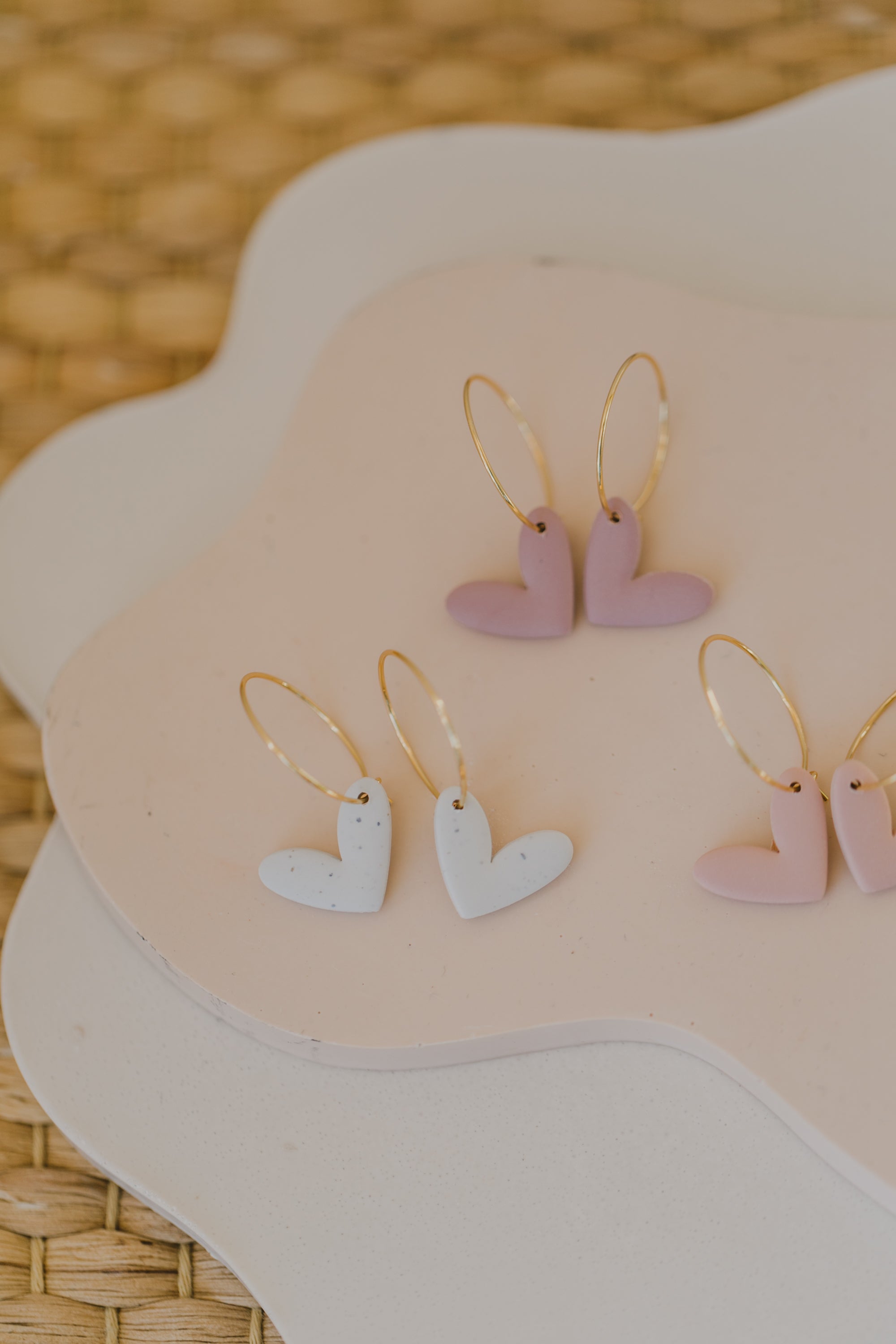 Hoop earrings with round polymer clay pendant and leaf