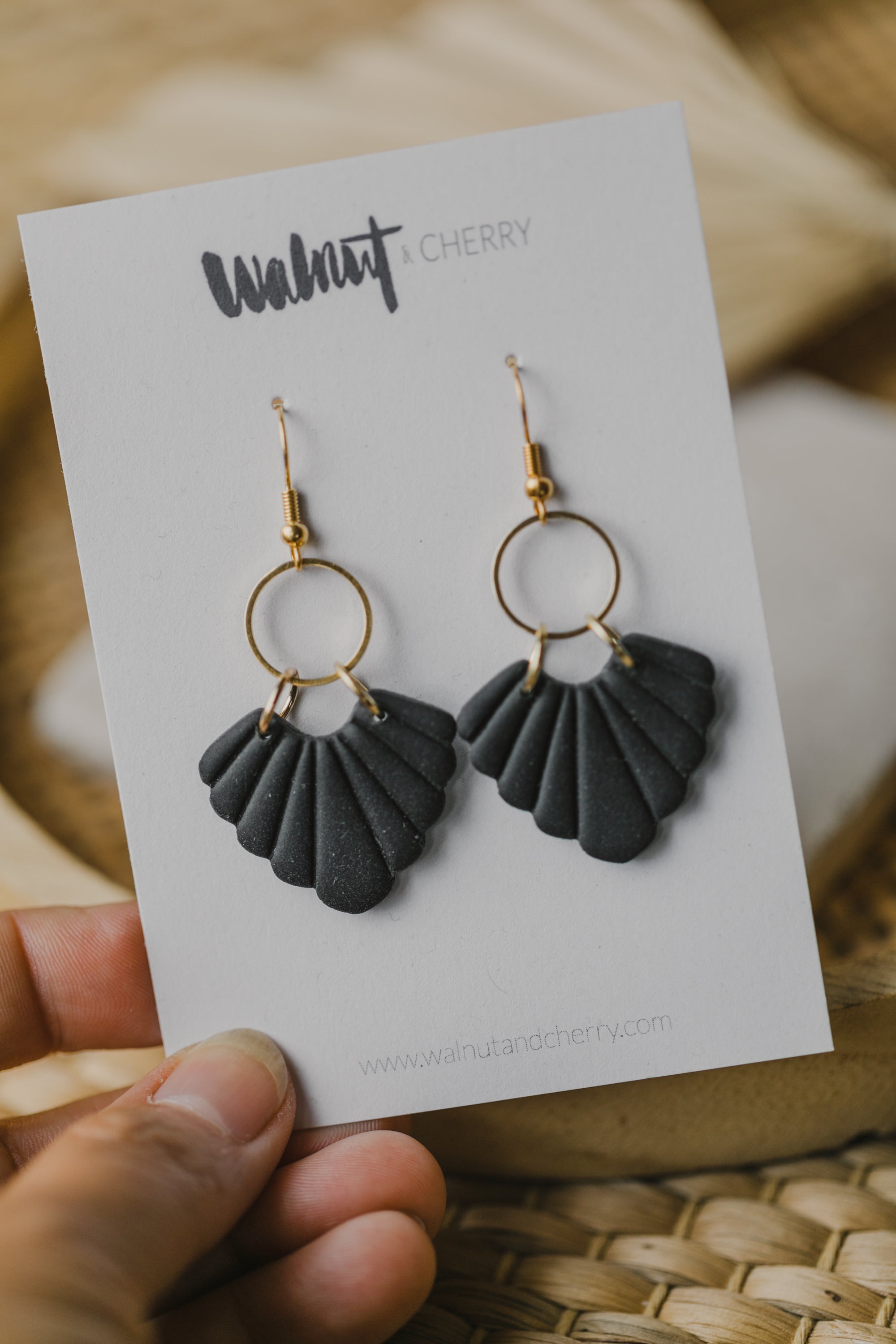 Hoop earrings with round polymer clay pendant and leaf