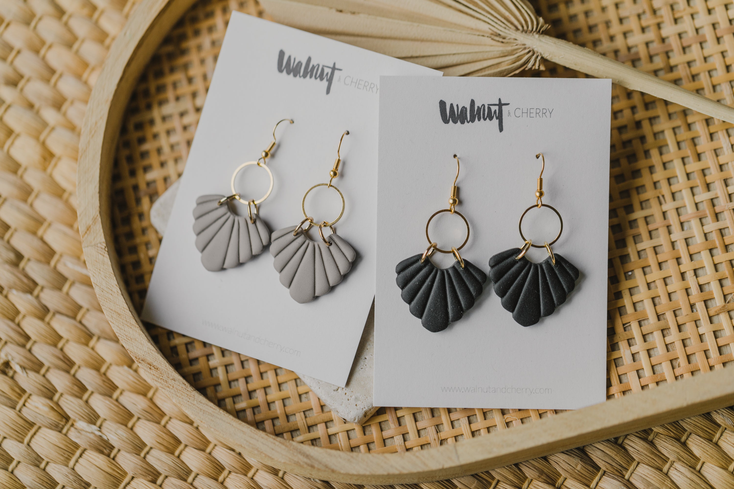 Hoop earrings with round polymer clay pendant and leaf