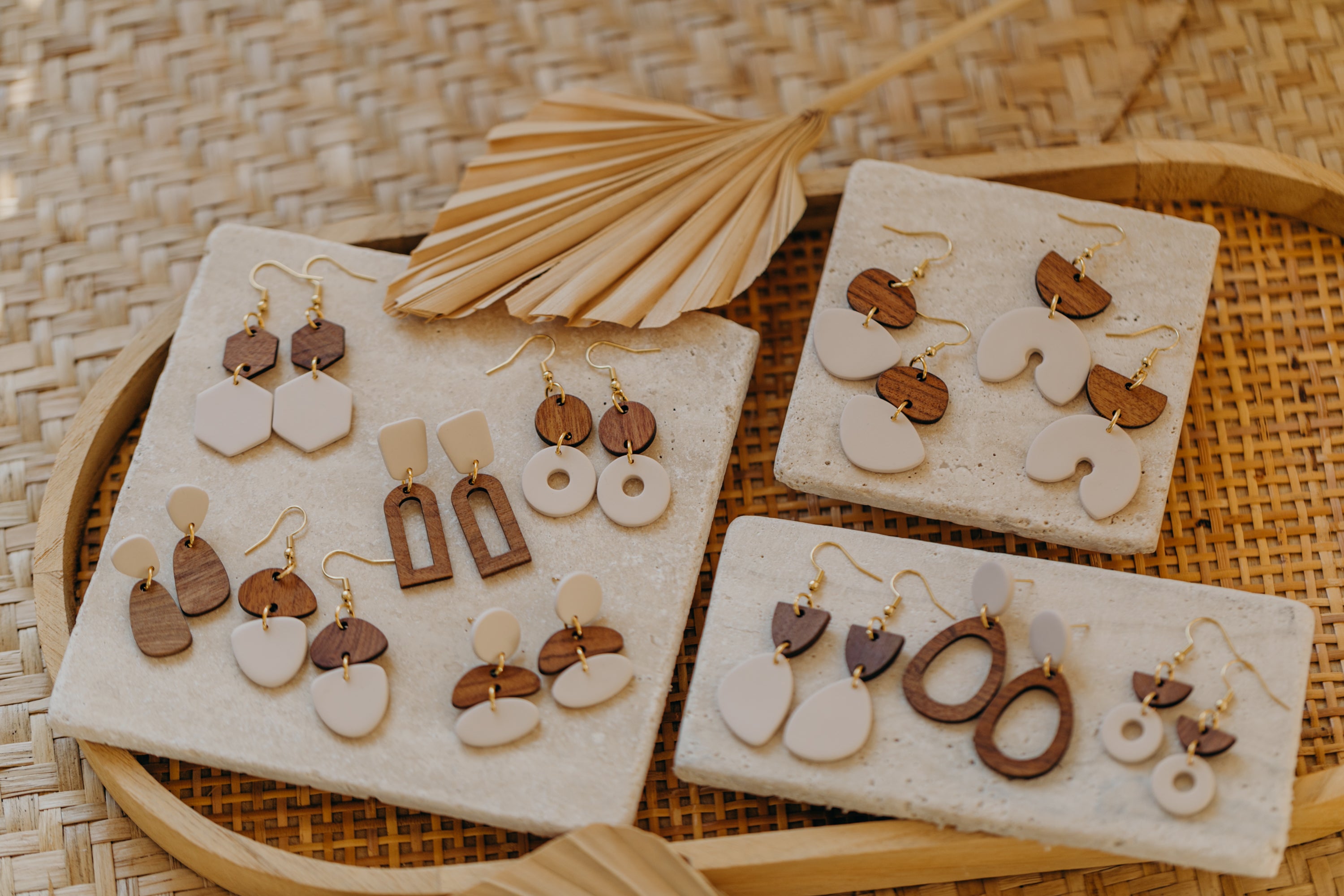 triangular polymer clay earrings in eucalyptus green with rectangular wooden pendant