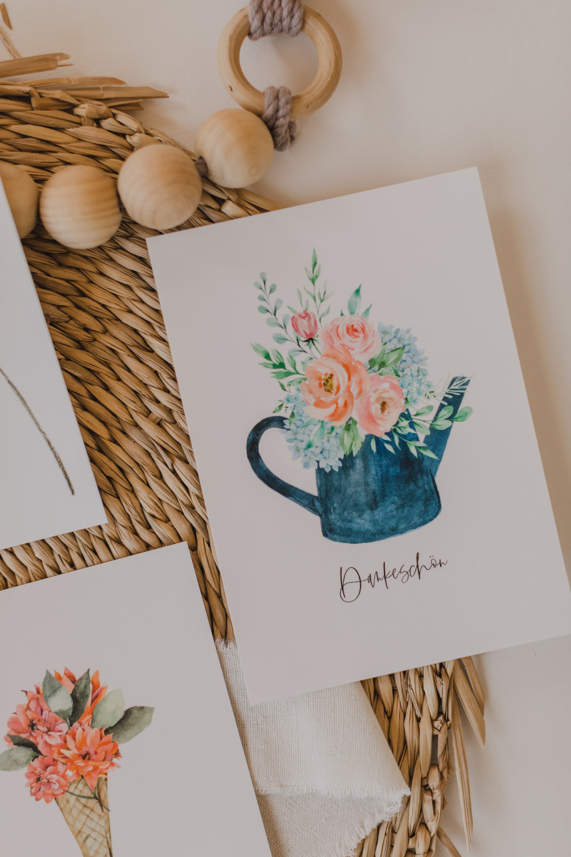 Postcard blue watering can with the print "Thank you"