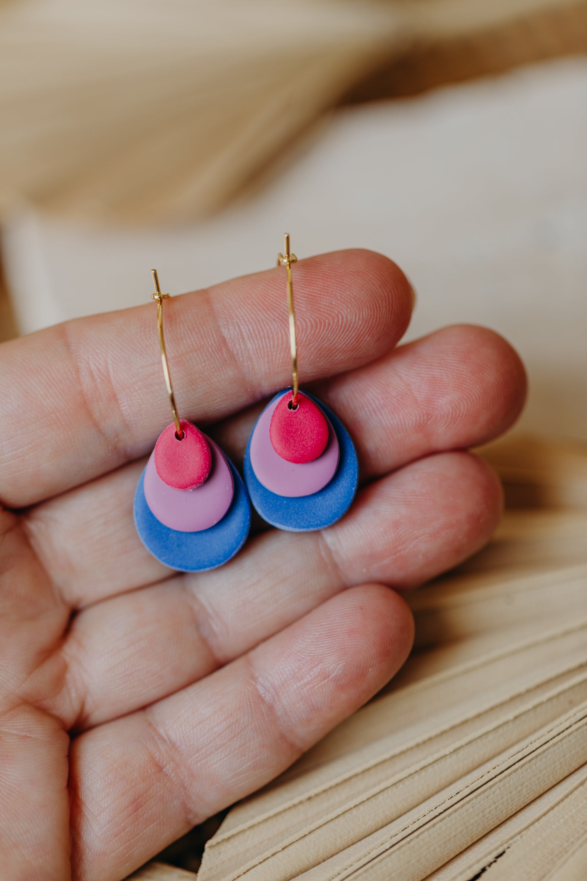 Creole with polymer clay earrings in drop shape in ceramic look