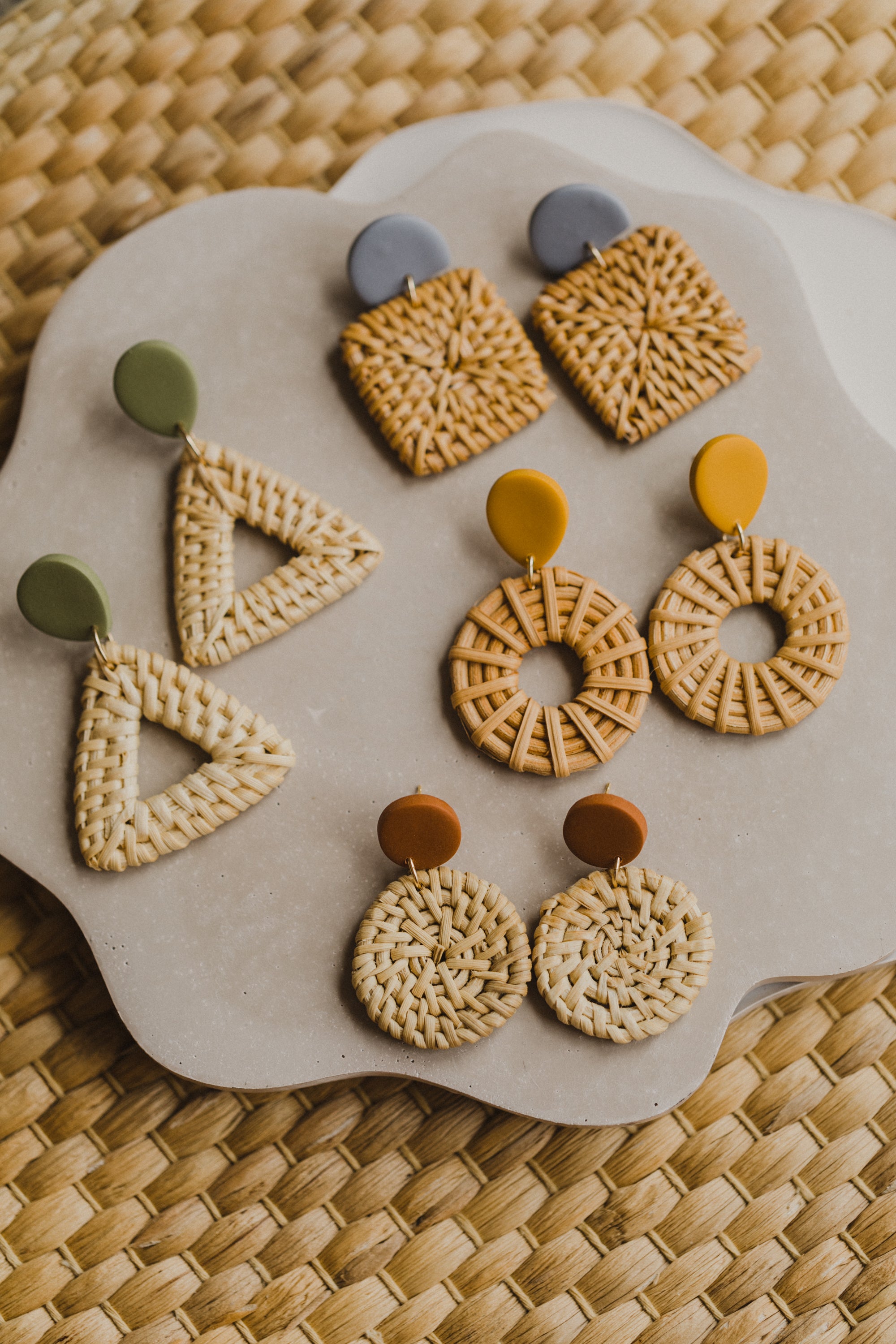 round polymer clay earrings in mustard yellow with rattan pendant circle
