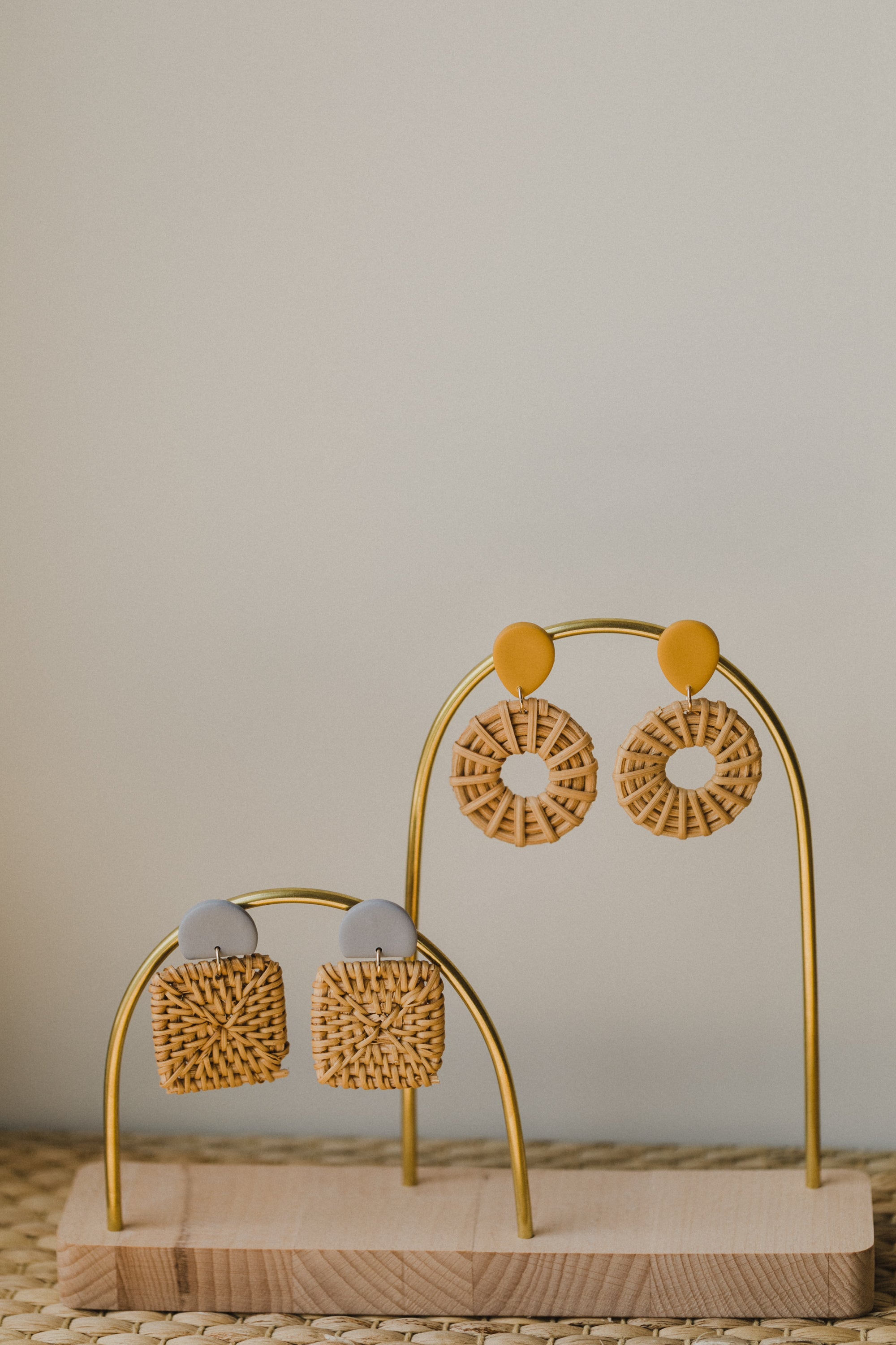 round polymer clay earrings in mustard yellow with rattan pendant circle