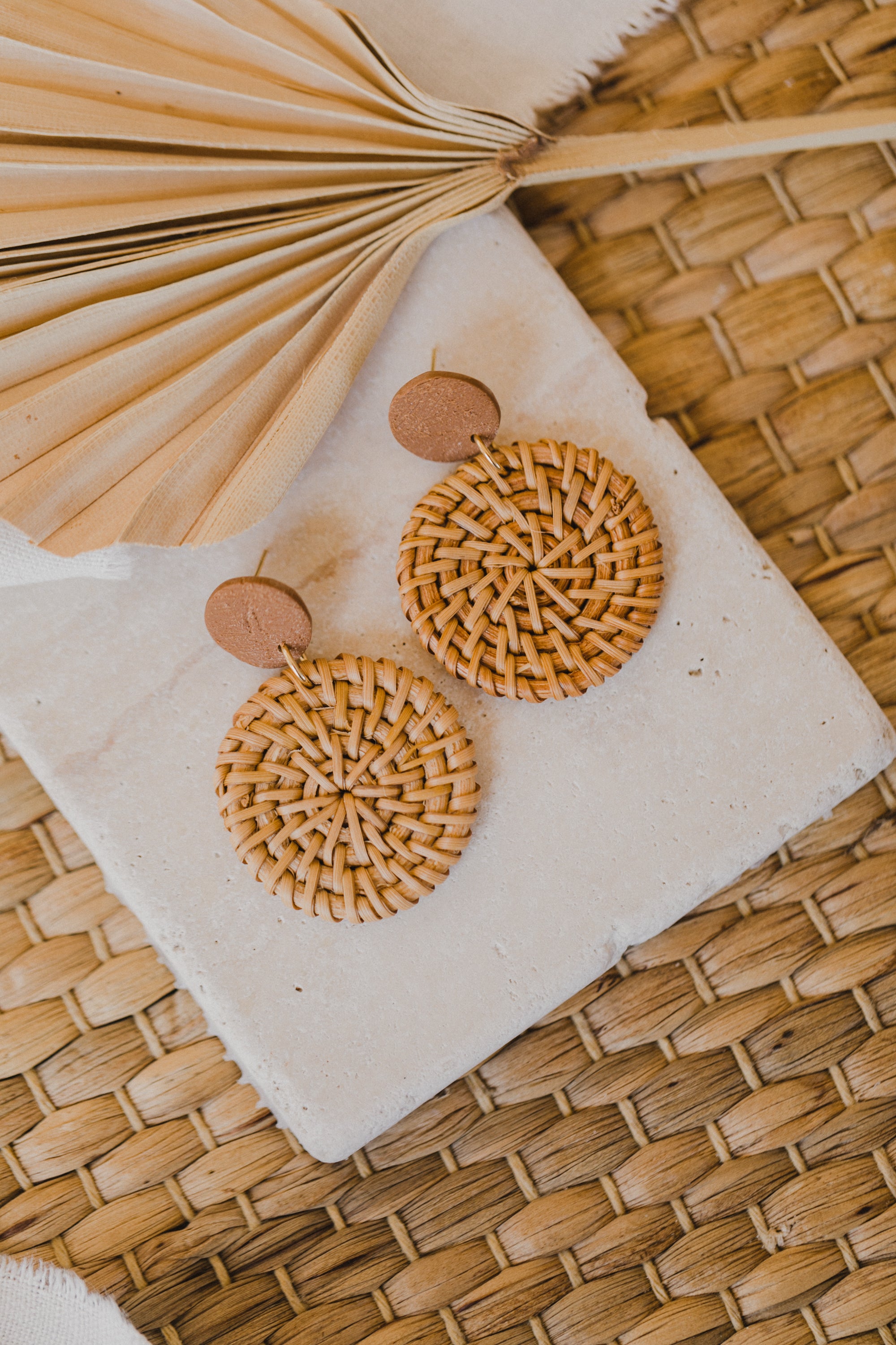 round brown polymer clay earrings with round rattan pendant