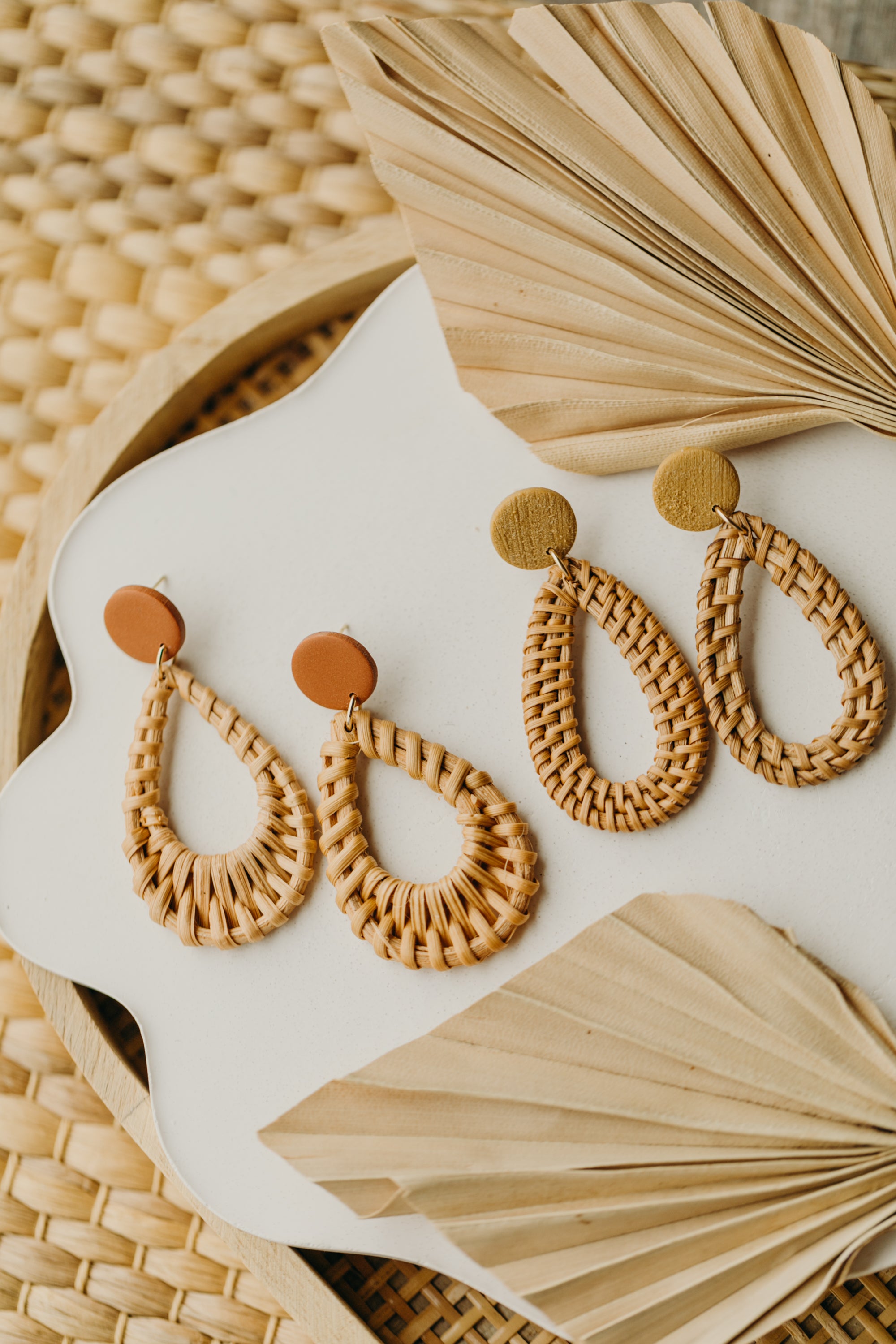 round polymer clay earrings in the color cinnamon with rattan pendant drops