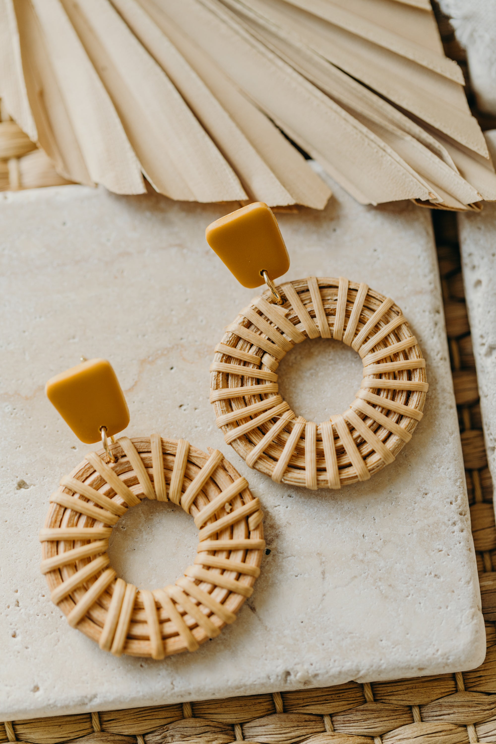 rectangular polymer clay earrings in the color mustard yellow with rattan pendant circle
