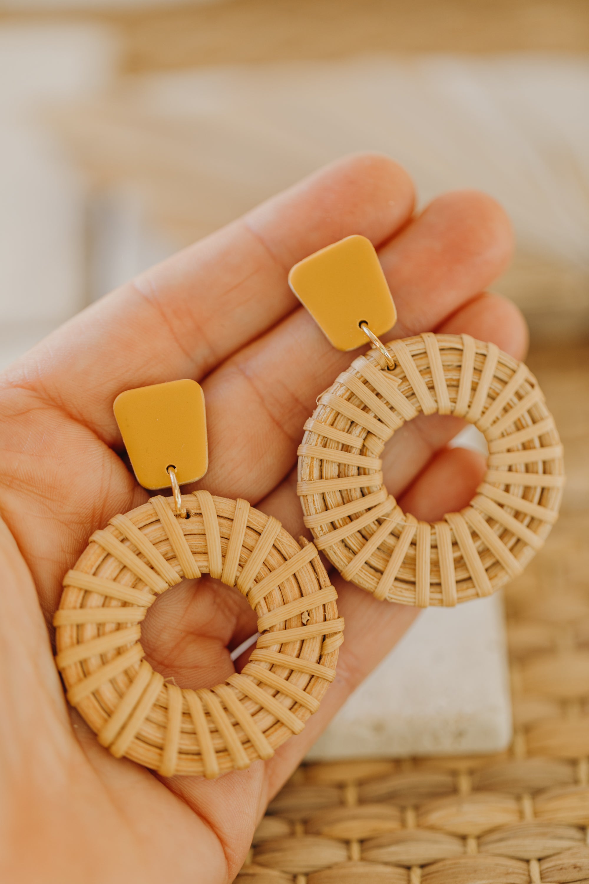 rectangular polymer clay earrings in the color mustard yellow with rattan pendant circle