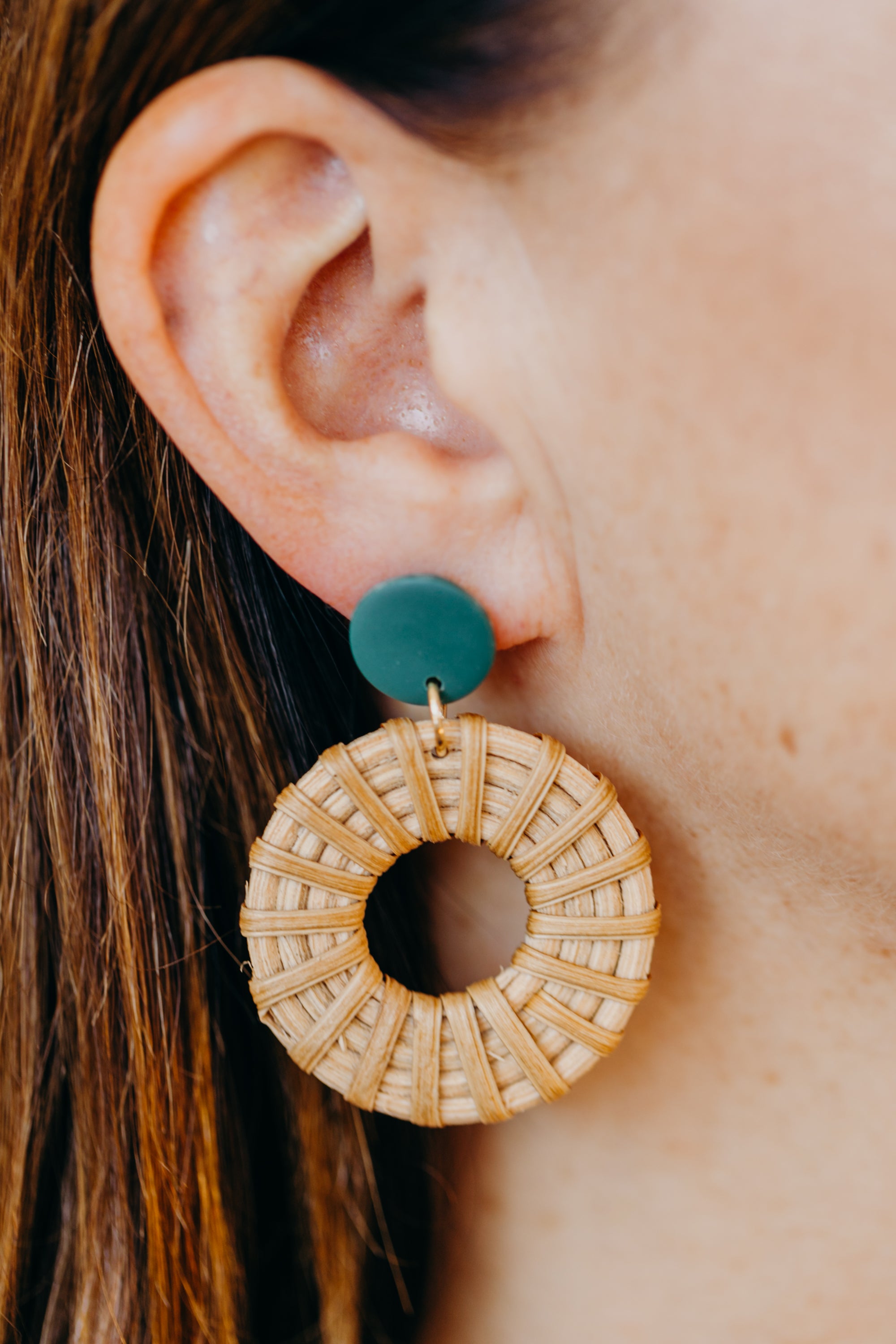 round polymer clay earrings in dark green with rattan pendant circle